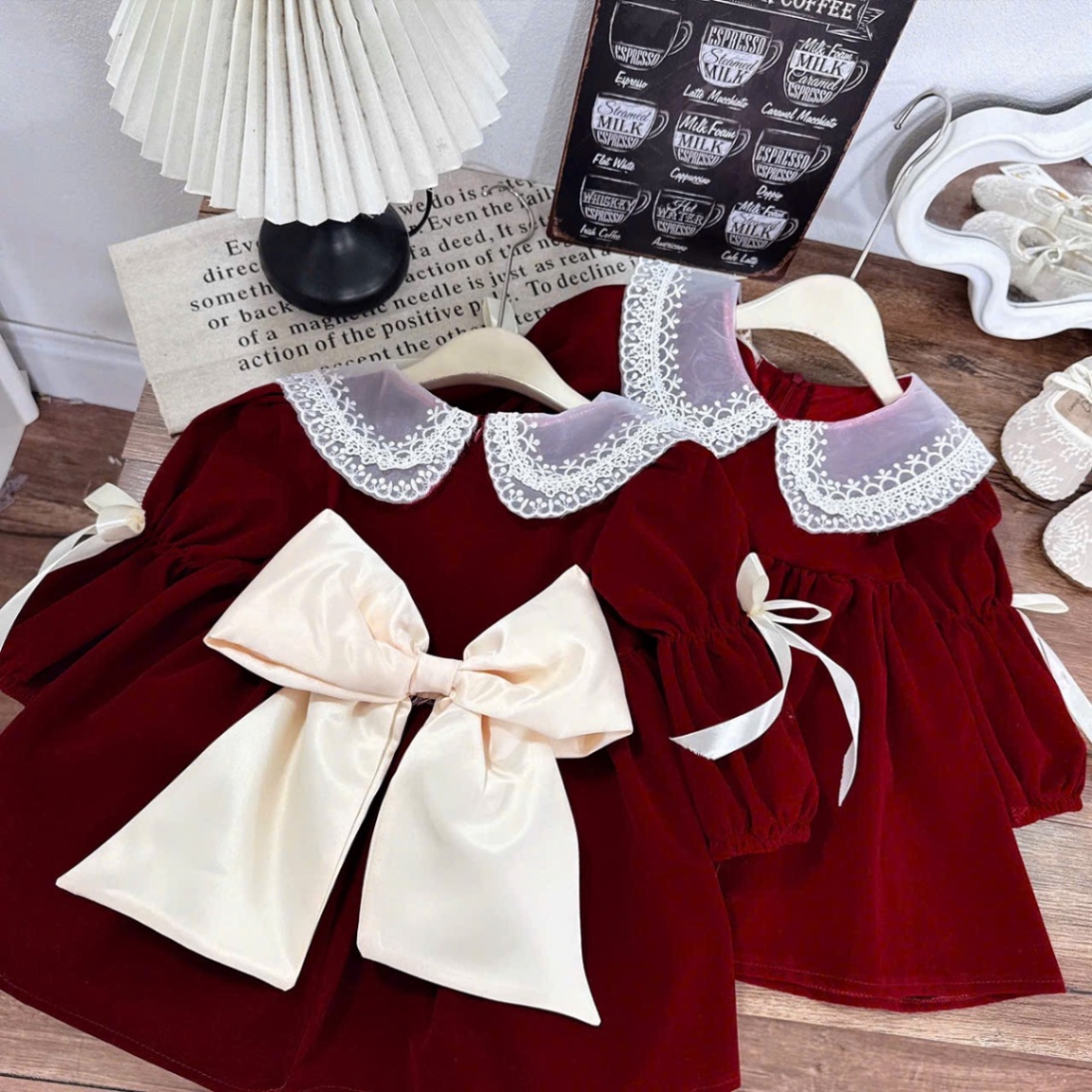 Váy nhung đỏ babydoll nơ sau xk bé gái