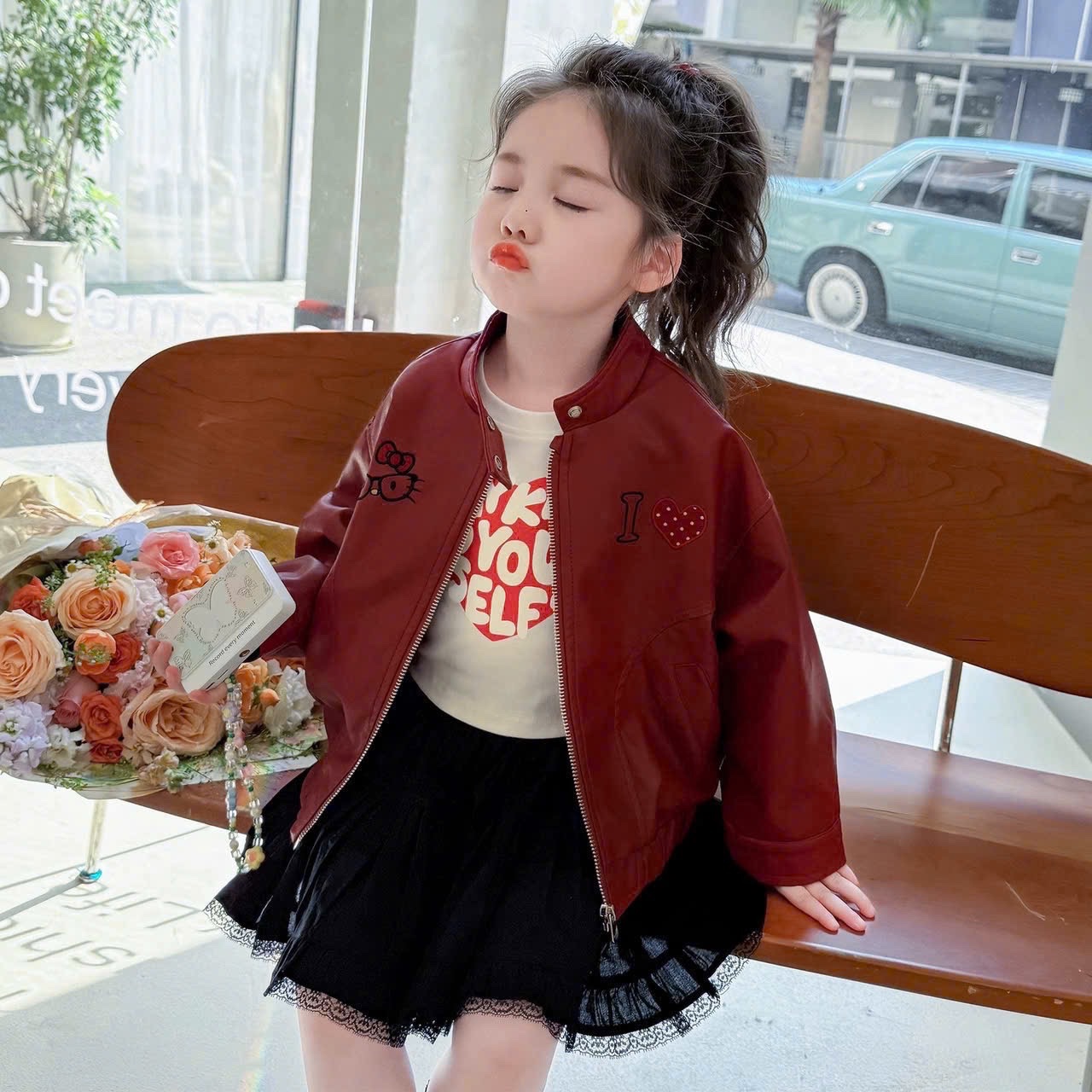 Áo da đỏ kitty bé gái