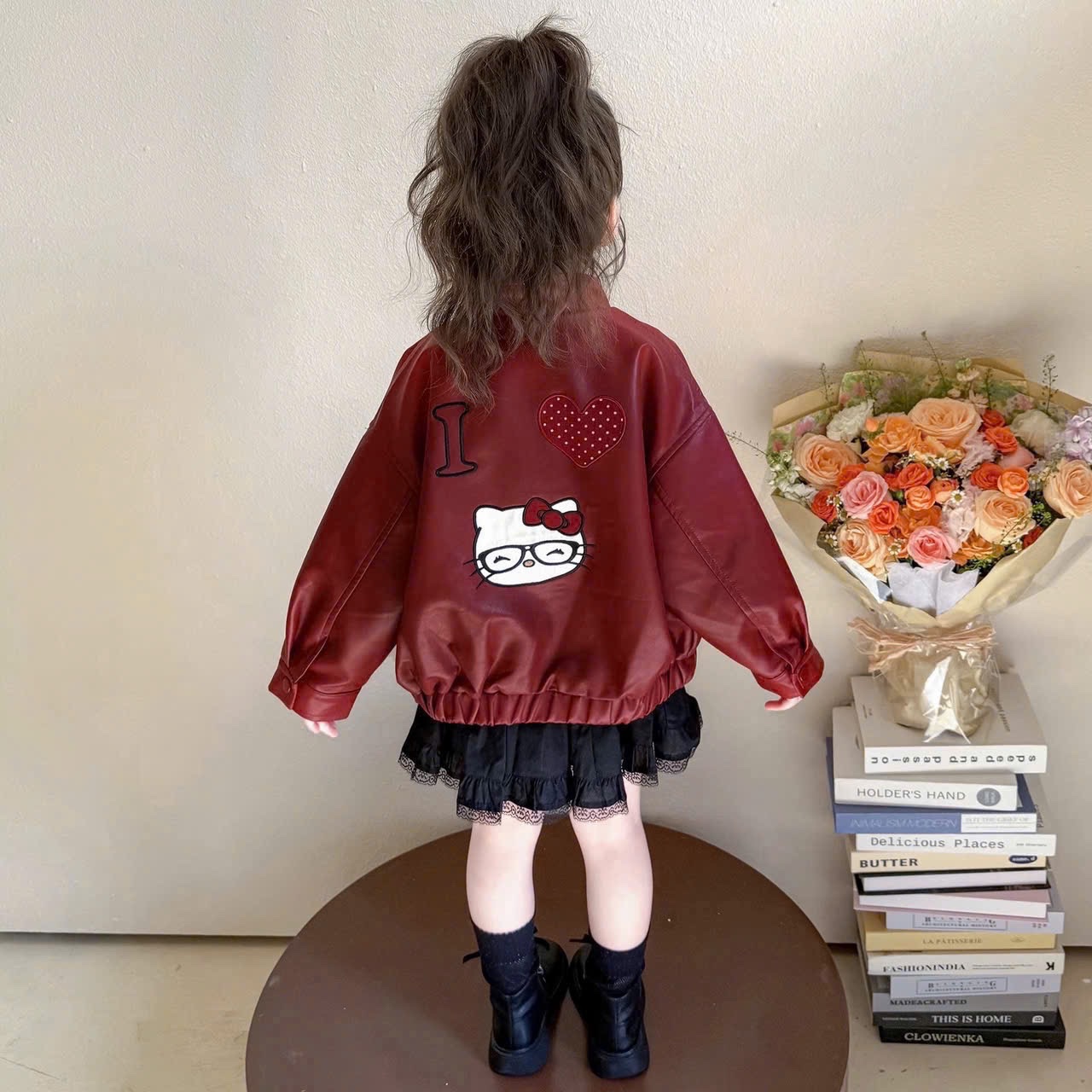 Áo da đỏ kitty bé gái