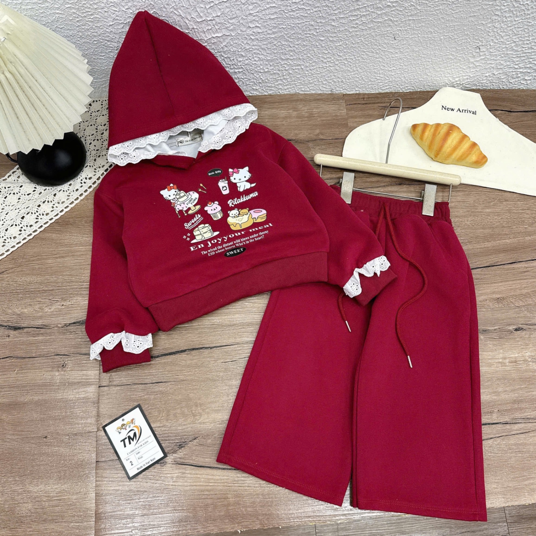 Sét bộ nỉ mũ vien ren quần xuông bé gái