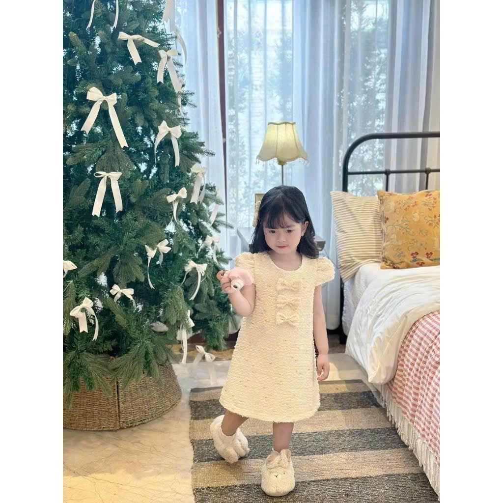 Váy dạ kem đỏ đính nơ bé gái