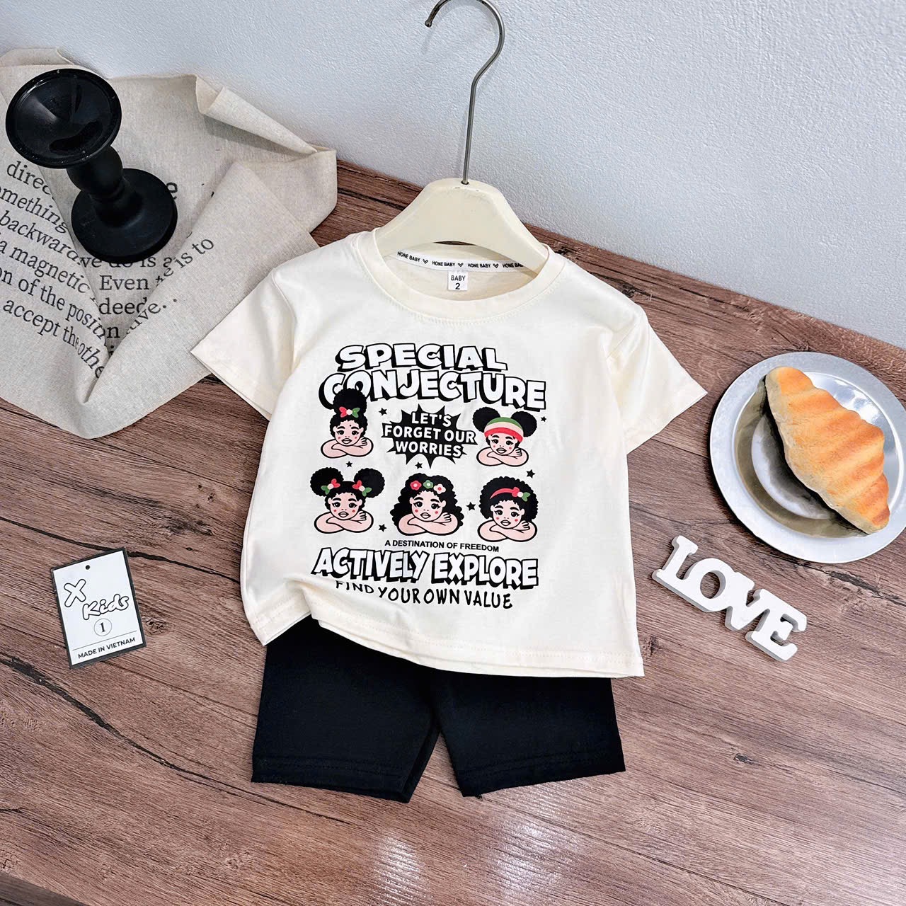 Sét bộ áo kem đen hình quần legging bé gái