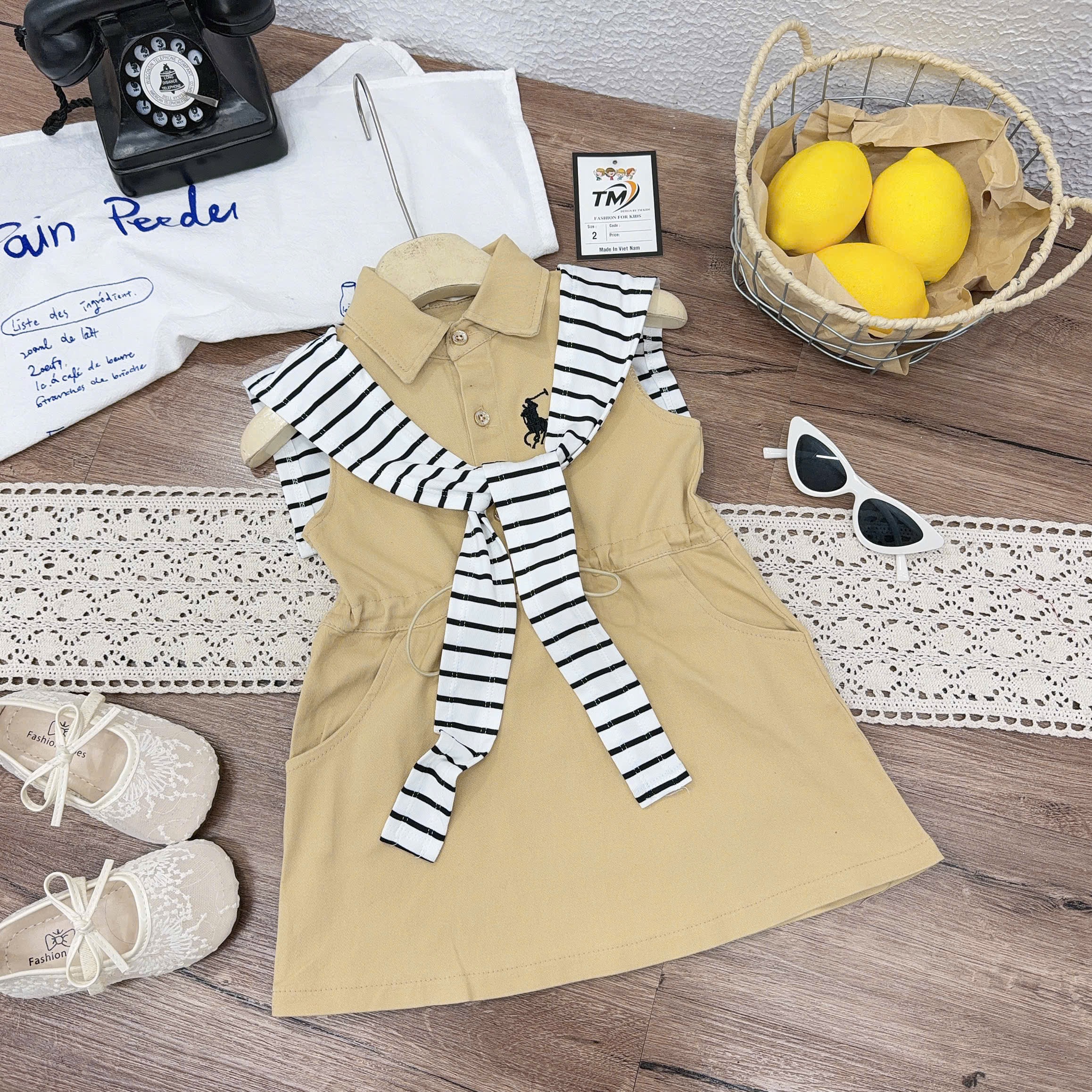 Váy bo eo kèm khăn kẻ bé gái