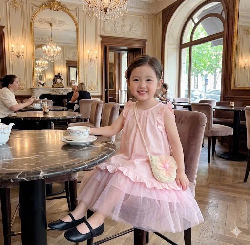 Váy hồng kèm túi bé gái tk