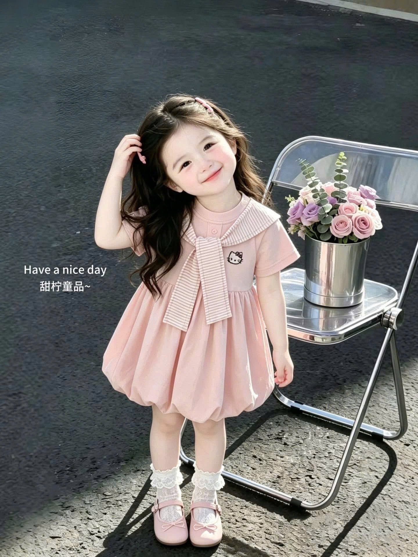 Váy hồng kitty kèm khăn kẻ bé gái