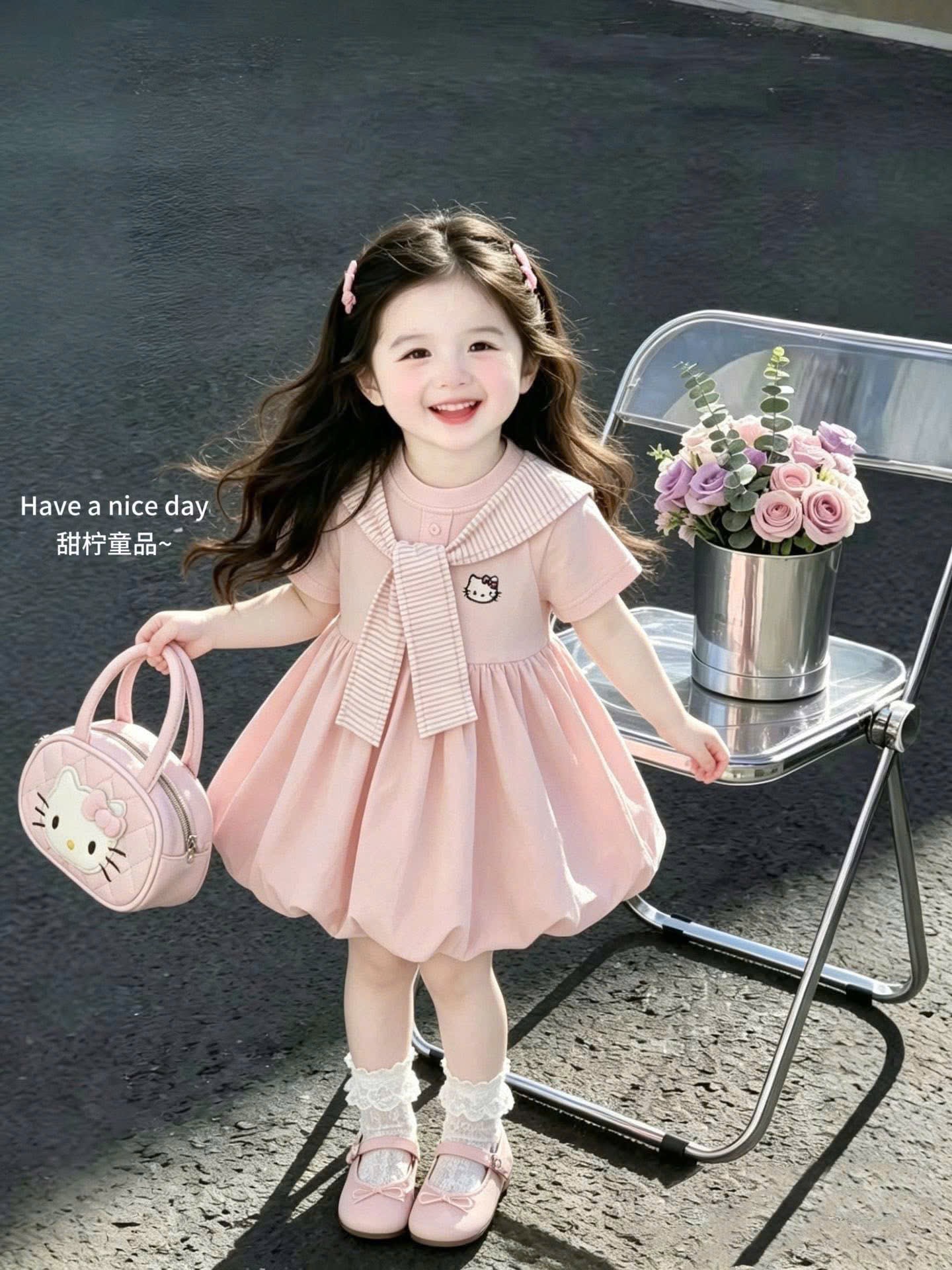 Váy hồng kitty kèm khăn kẻ bé gái