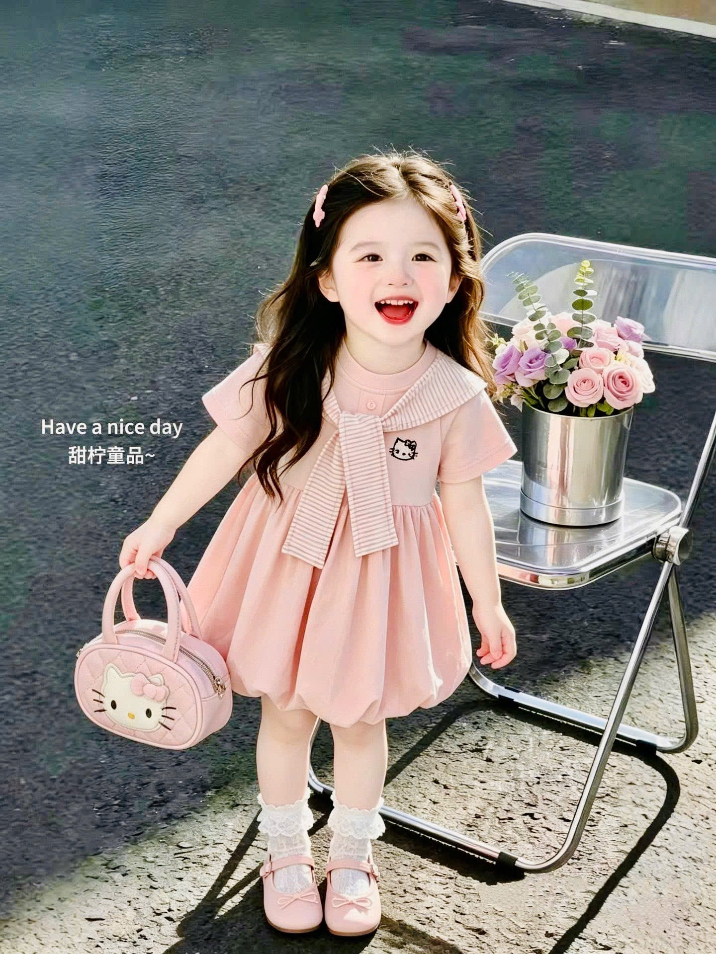 Váy hồng kitty kèm khăn kẻ bé gái