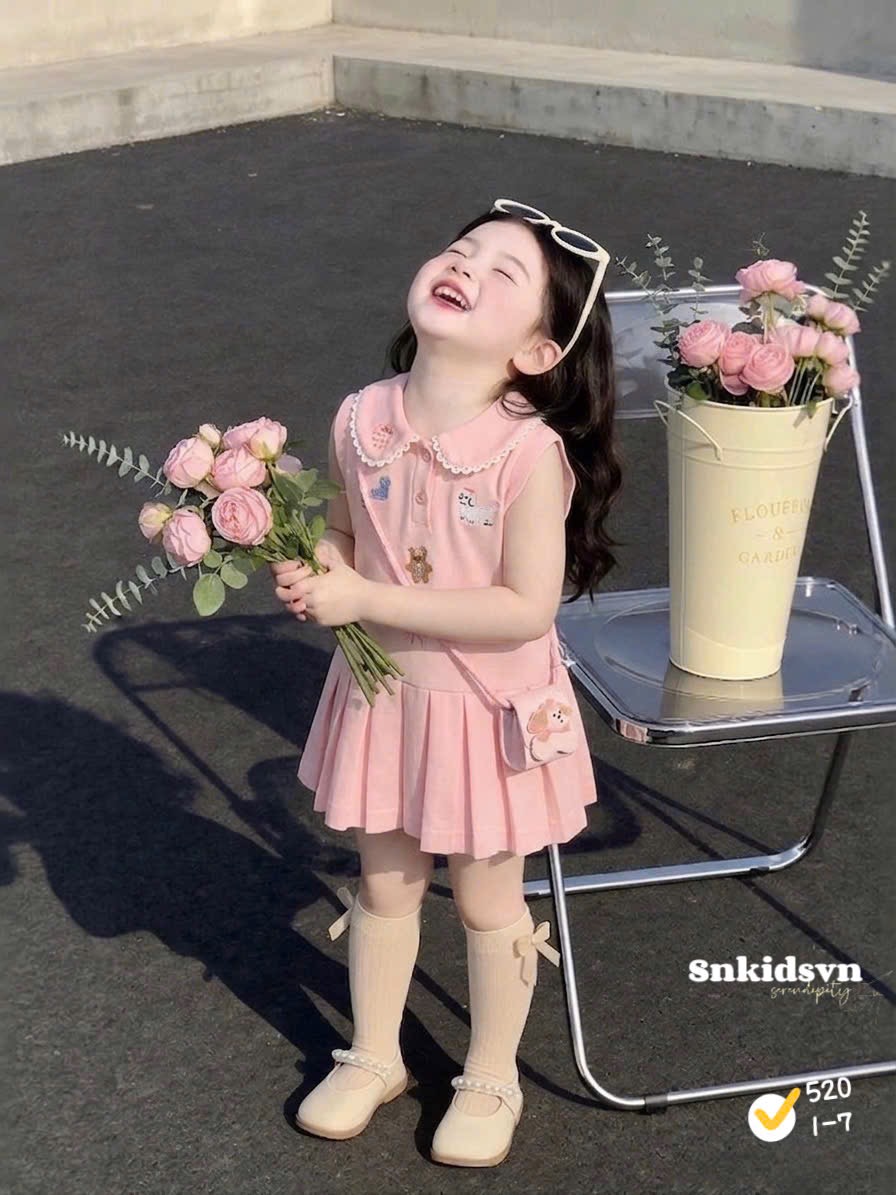 Váy polo hồng bé gái