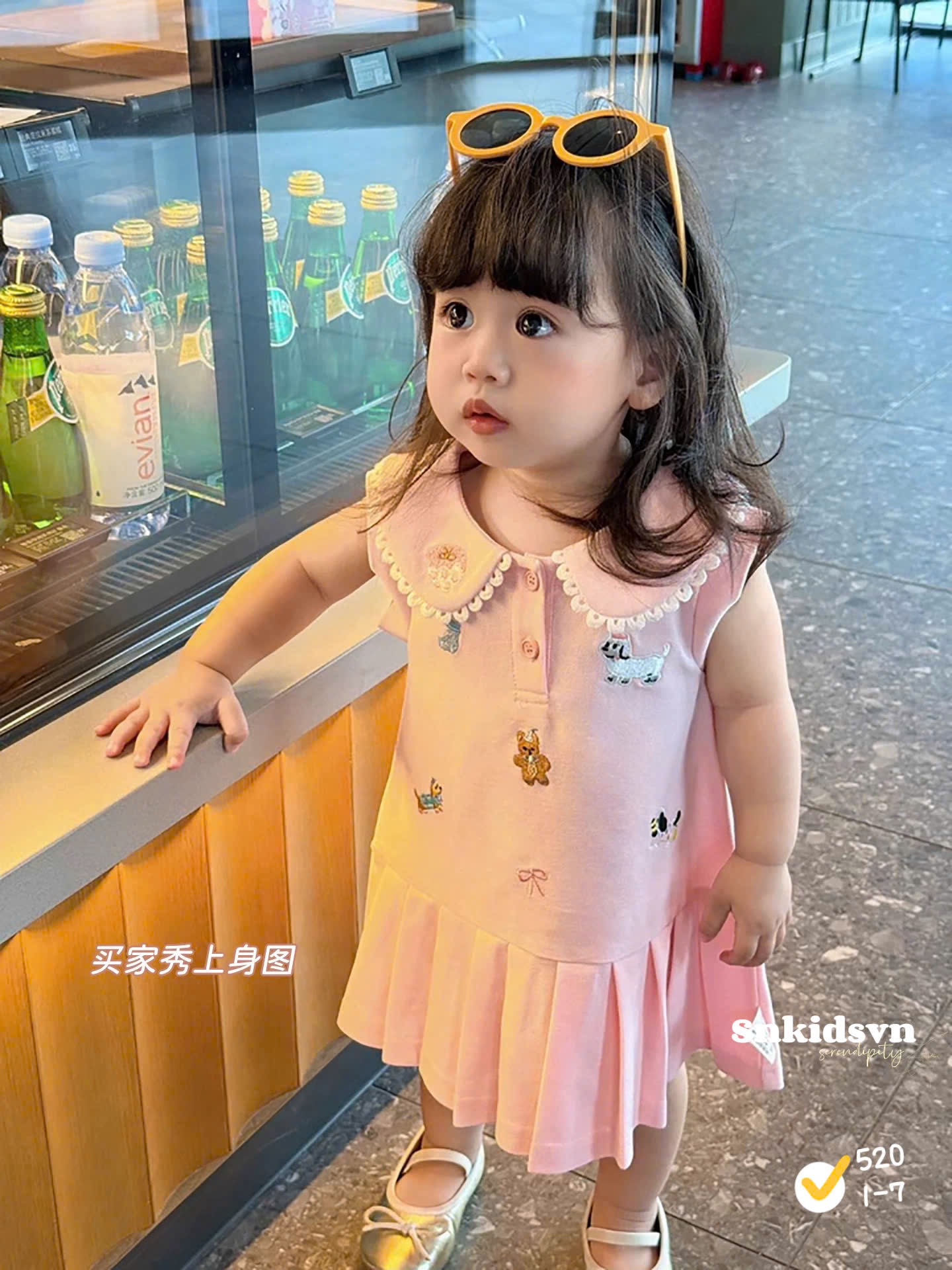 Váy polo hồng bé gái