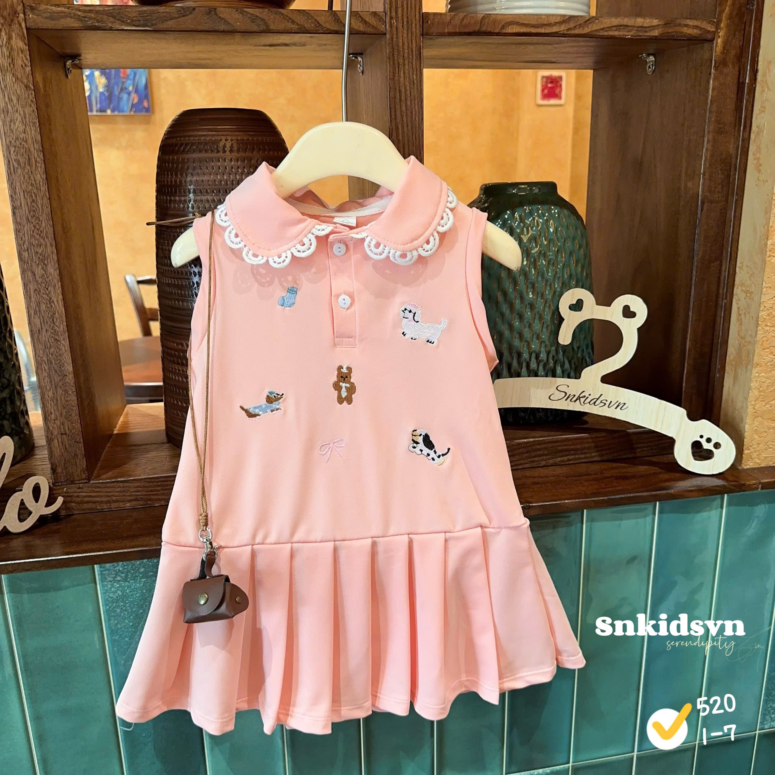 Váy polo hồng bé gái