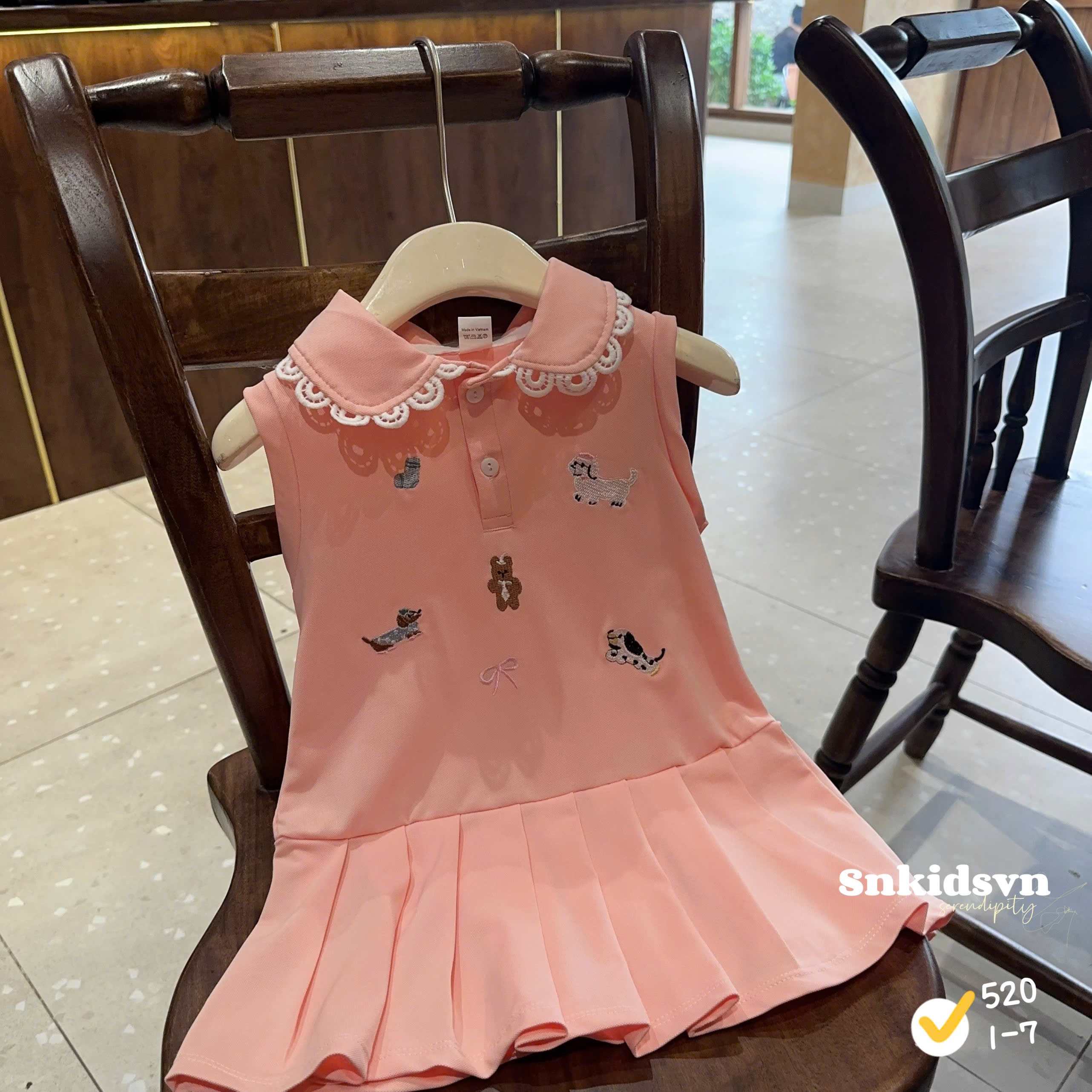 Váy polo hồng bé gái