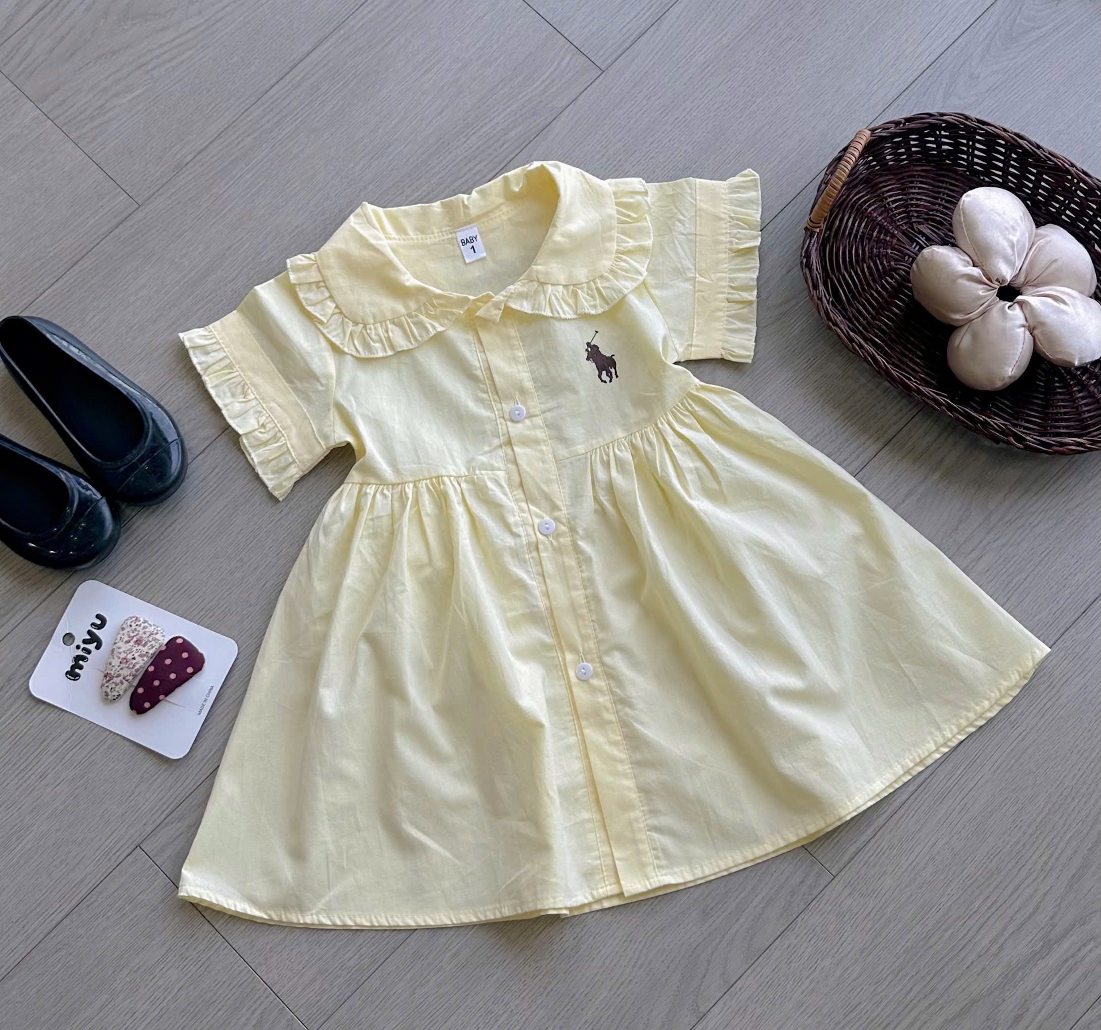 Váy vàng chữ A bé gái