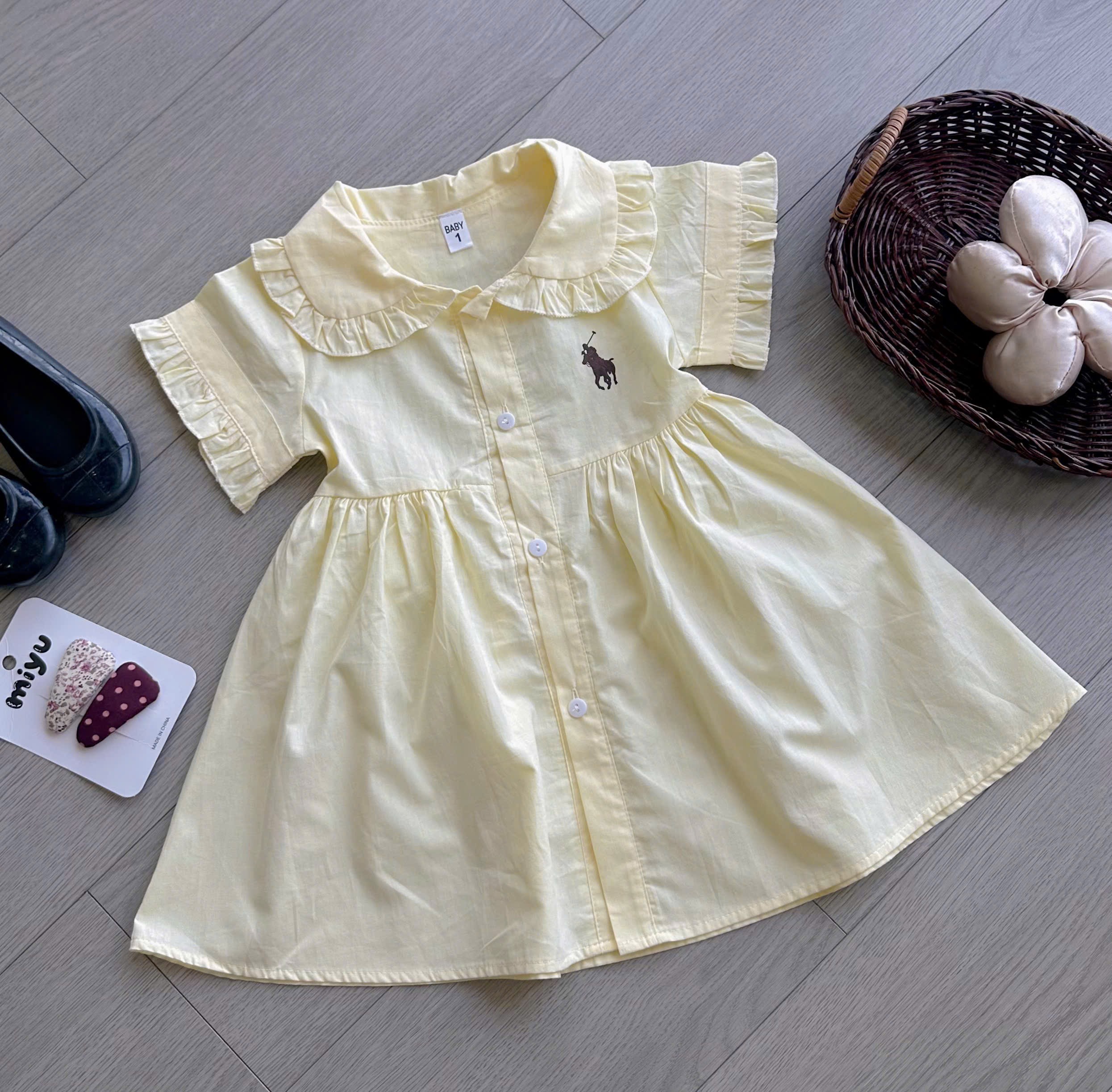 Váy vàng chữ A bé gái