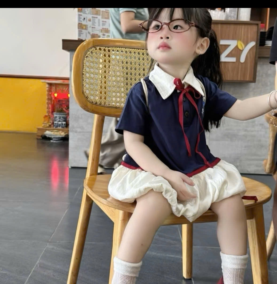 Váy xanh than thân bồng kèm túi bé gái