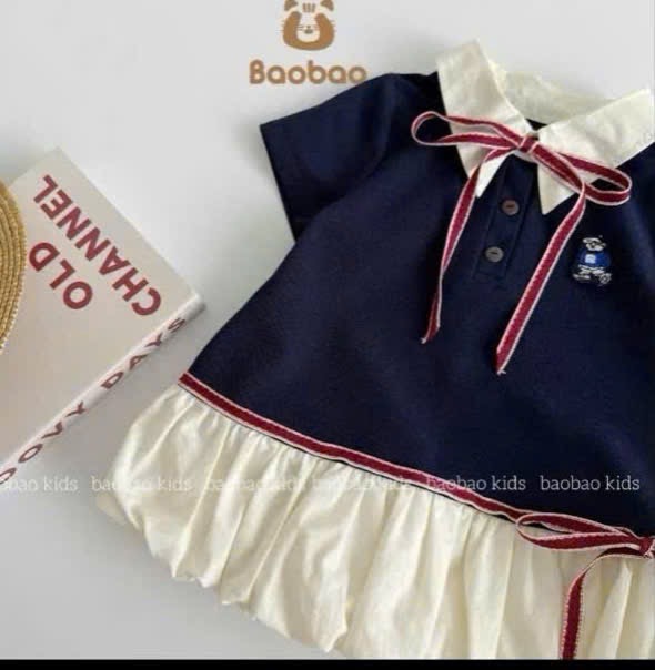 Váy xanh than thân bồng kèm túi bé gái