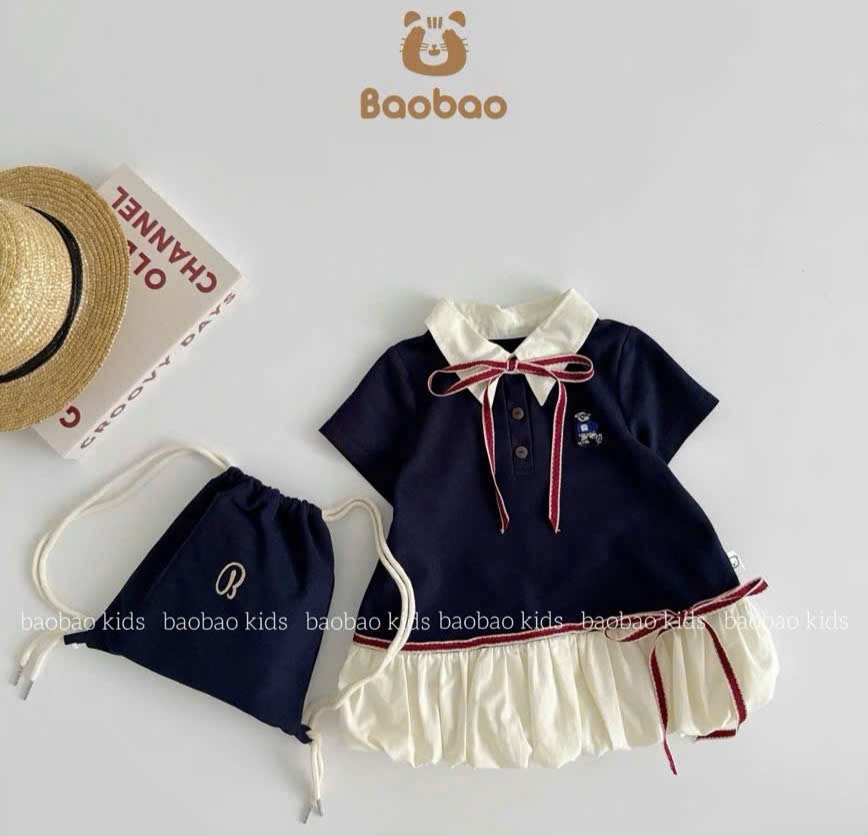 Váy xanh than thân bồng kèm túi bé gái