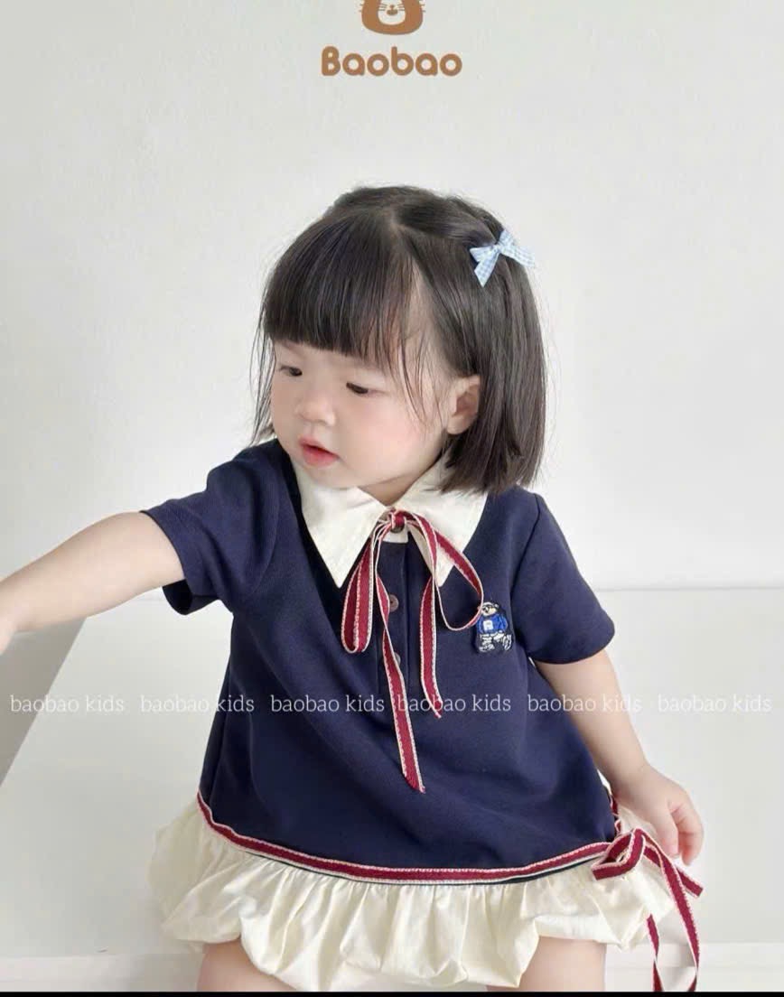 Váy xanh than thân bồng kèm túi bé gái