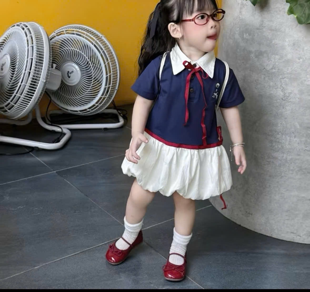 Váy xanh than thân bồng kèm túi bé gái