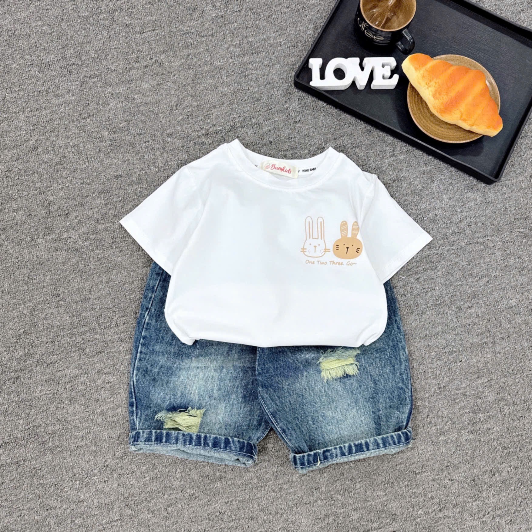 Xả quần sooc bò bé trai