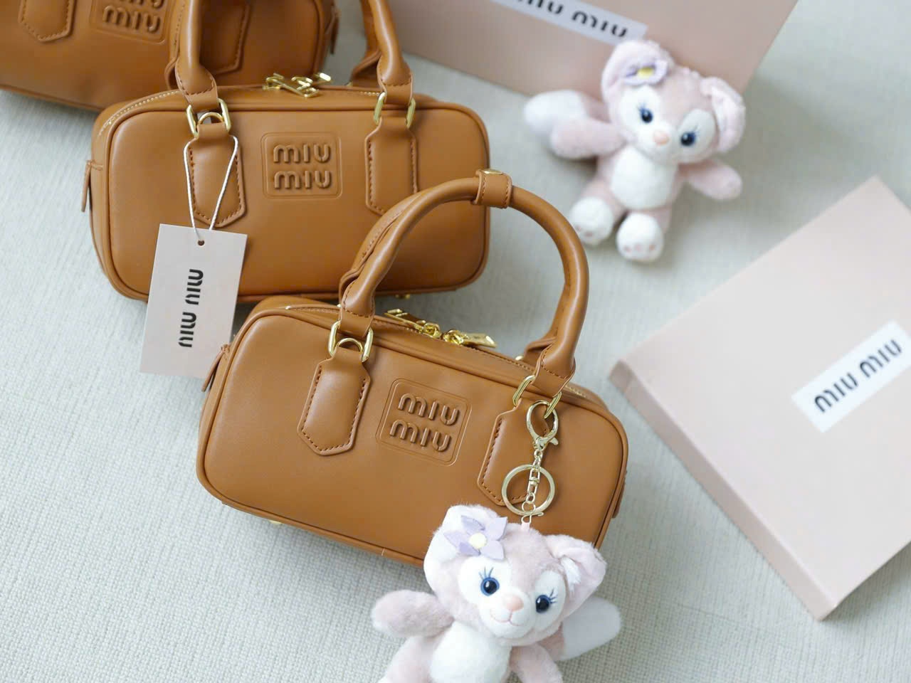 H3389- TÚI XÁCH MIUMIU NÂU PULLBOX SZ 23