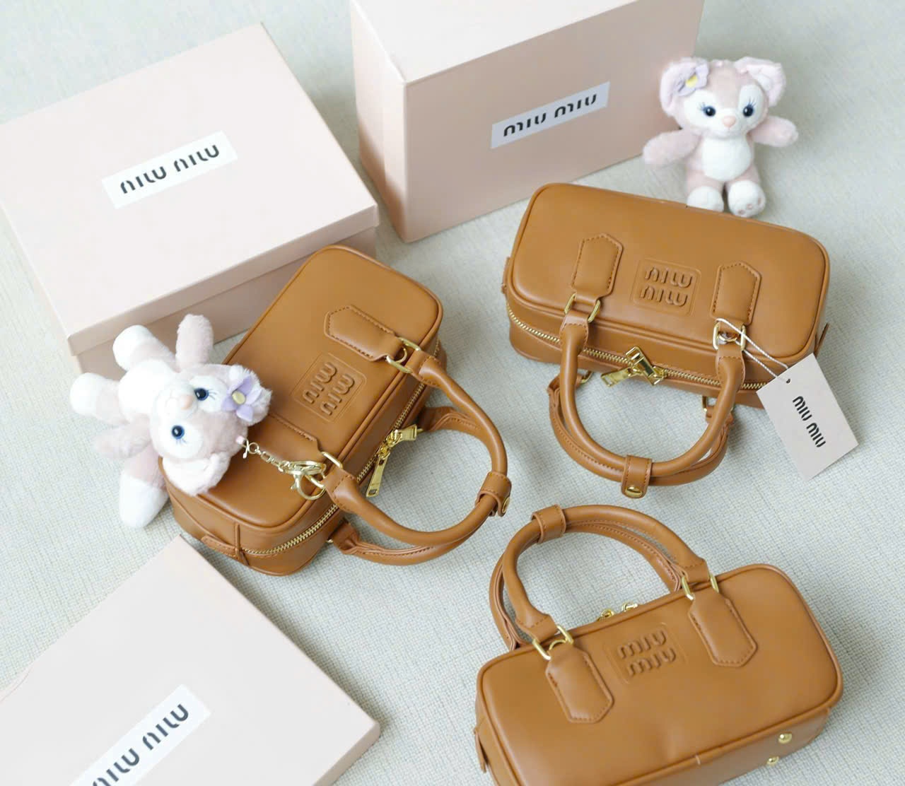 H3389- TÚI XÁCH MIUMIU NÂU PULLBOX SZ 23