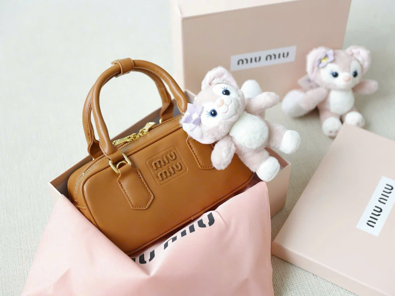 H3389- TÚI XÁCH MIUMIU NÂU PULLBOX SZ 23