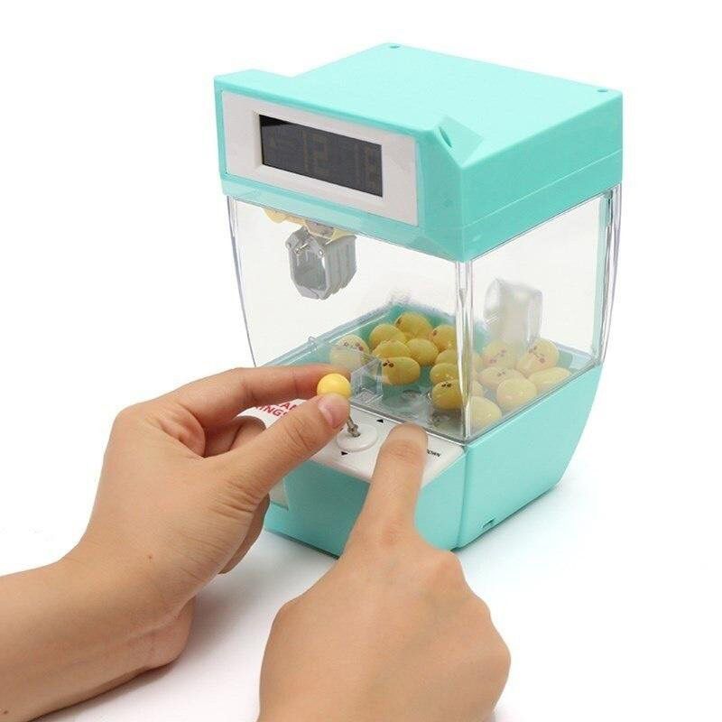 Đồng hồ Báo thức Máy Gắp Kẹo (Candy Grabber Alarm Clock)