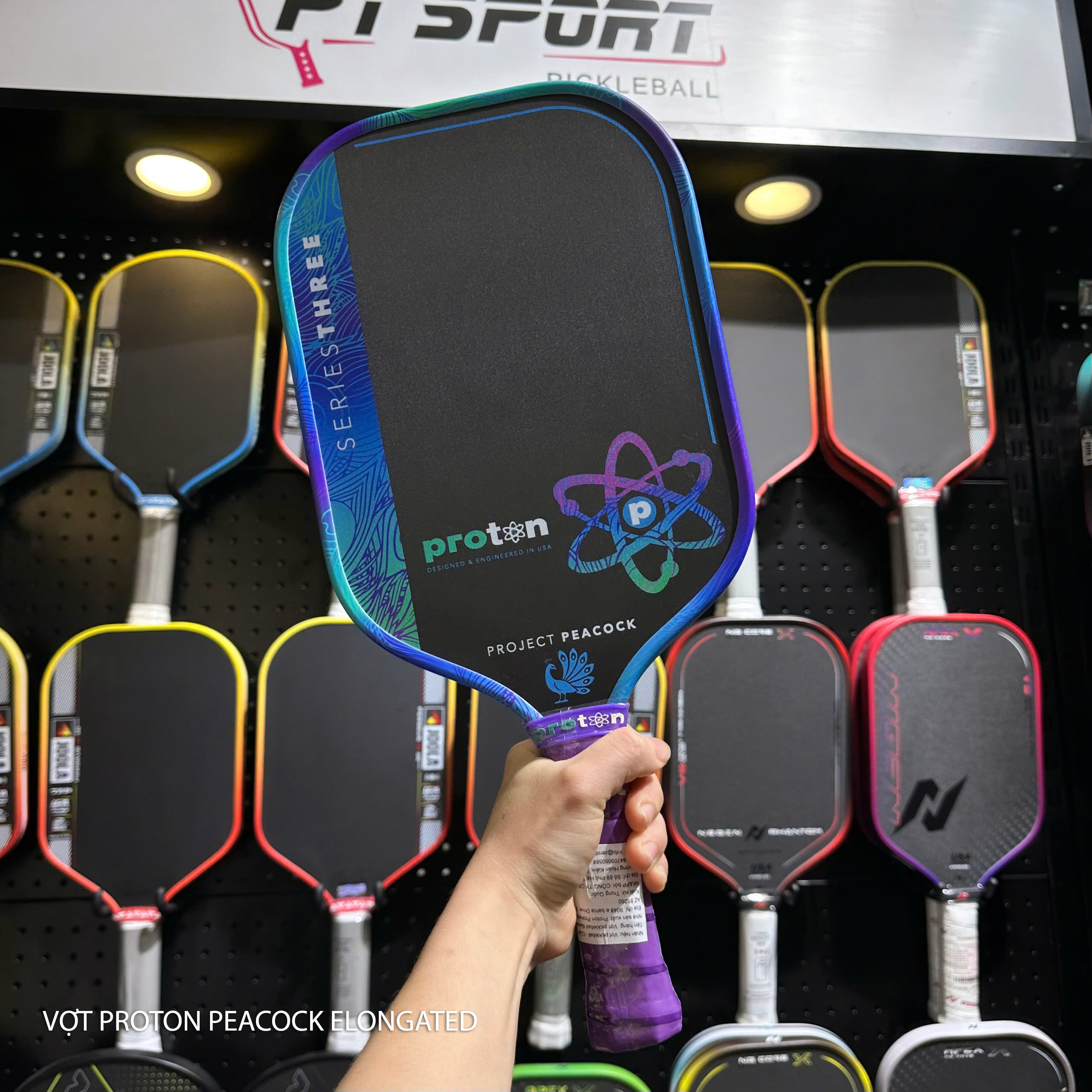 VỢT PROTON PEACOCK ELONGATED