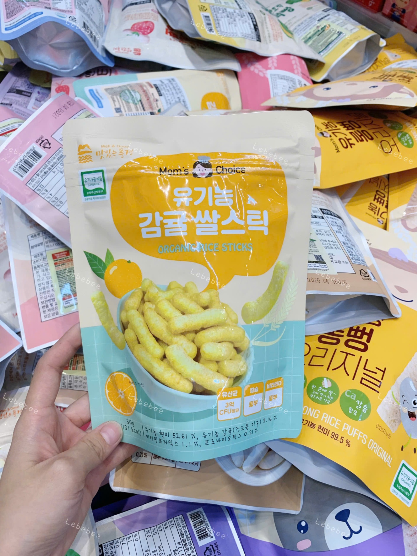 Bánh gạo lứt hữu cơ bổ sung lợi khuẩn hình que Mom’s Choice cho bé 6m+- Vị Quýt (30g)