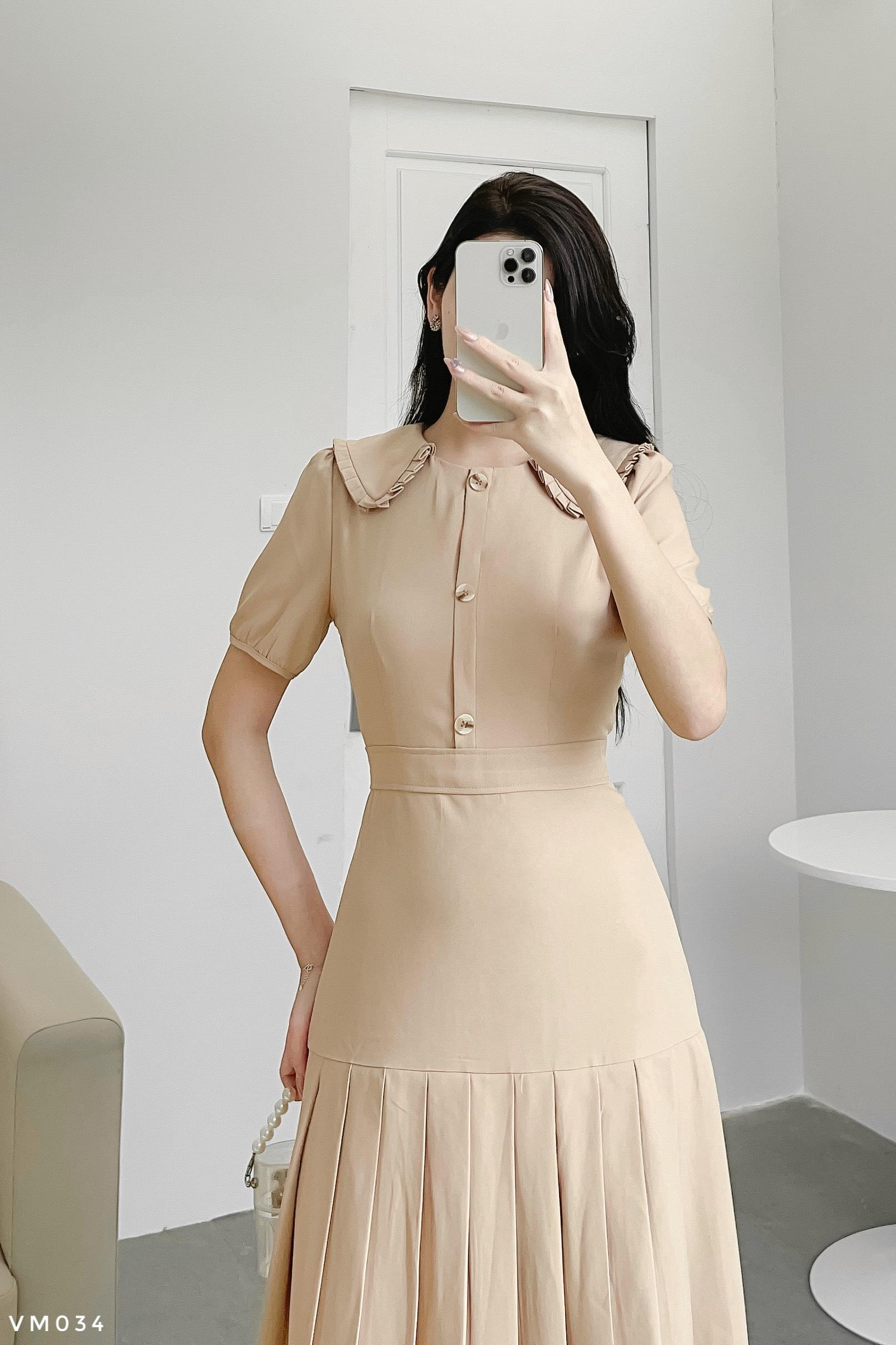 Váy midi xếp ly cách điệu phối cúc nữ tính
