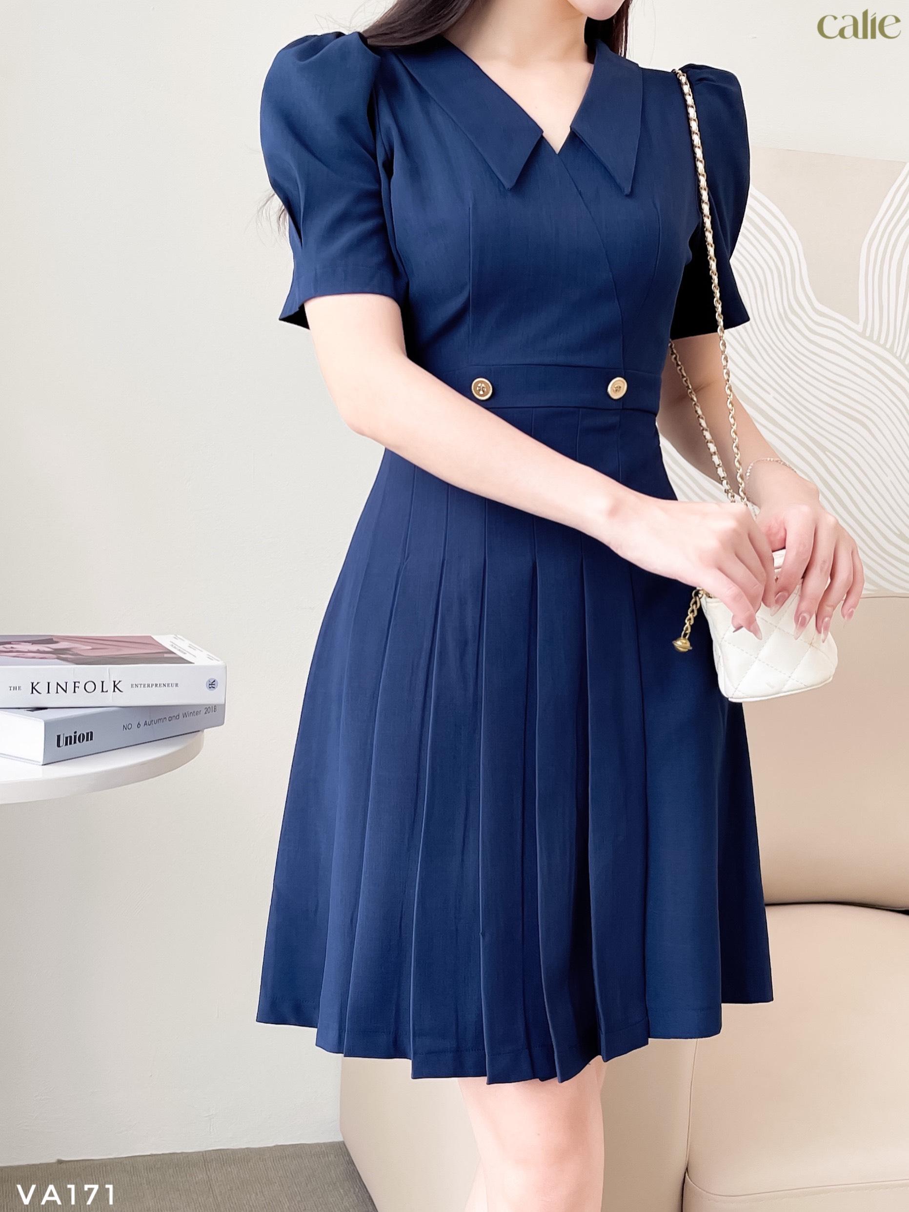 Váy dáng A xếp ly phối cúc đồng thanh lịch