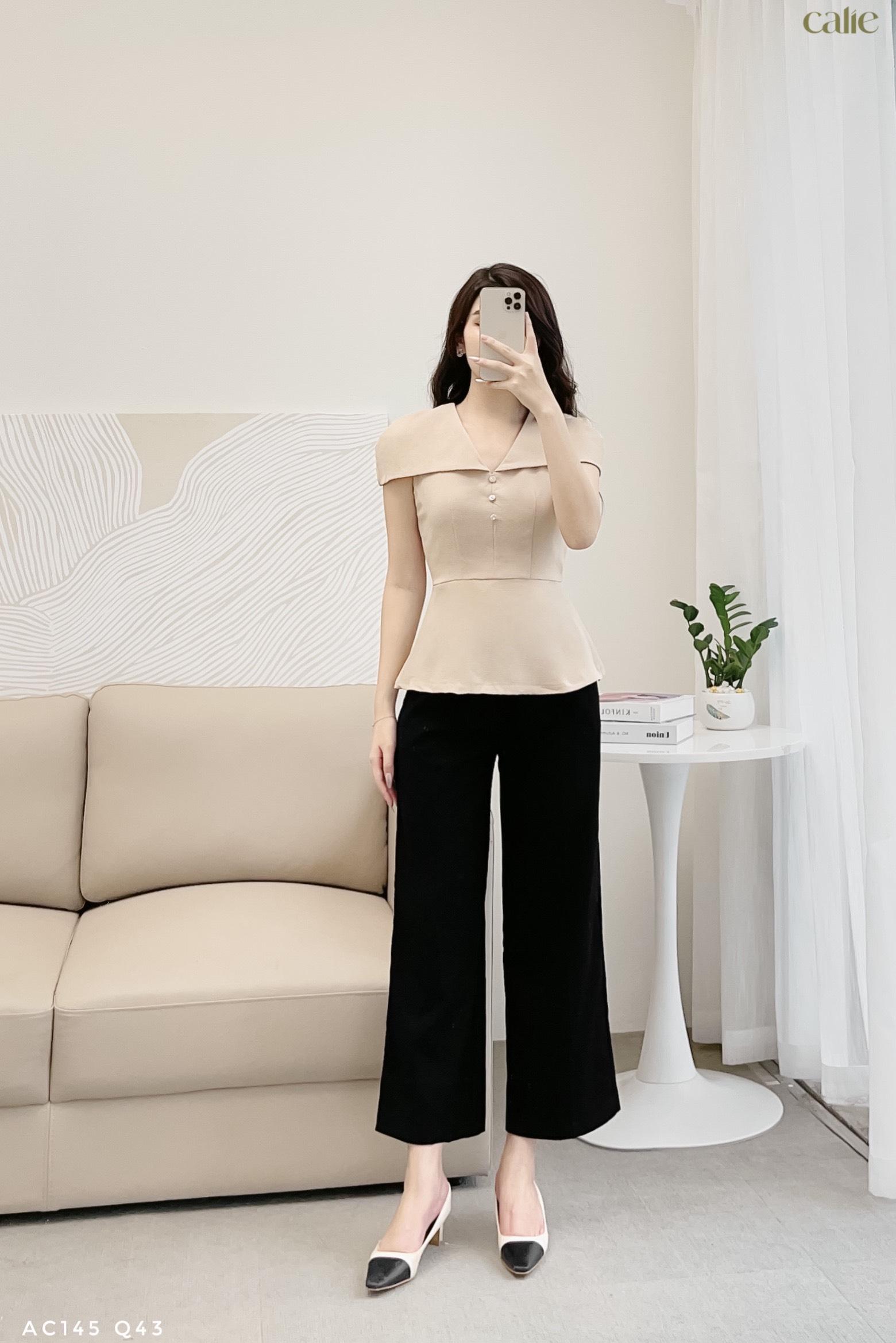 Áo cách điệu cổ V đính cúc đá sang chảnh