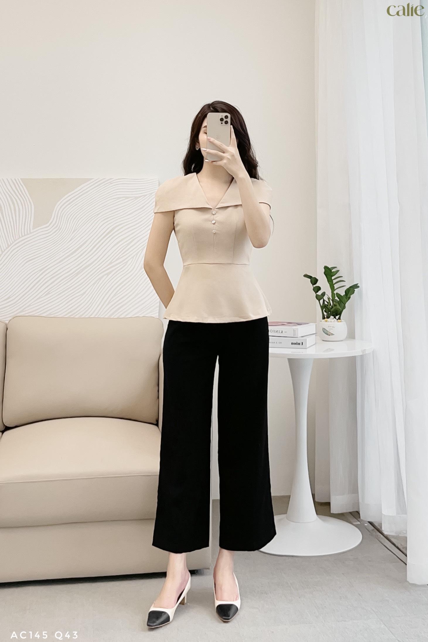 Áo cách điệu cổ V đính cúc đá sang chảnh