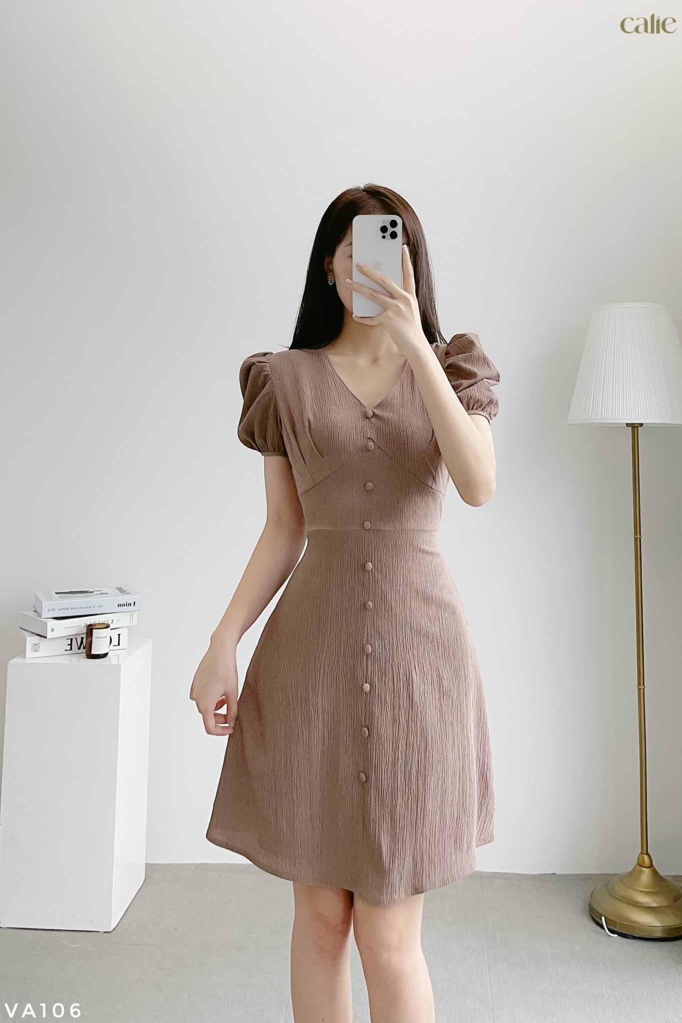 Váy dáng A tay bồng cúc bọc trẻ trung