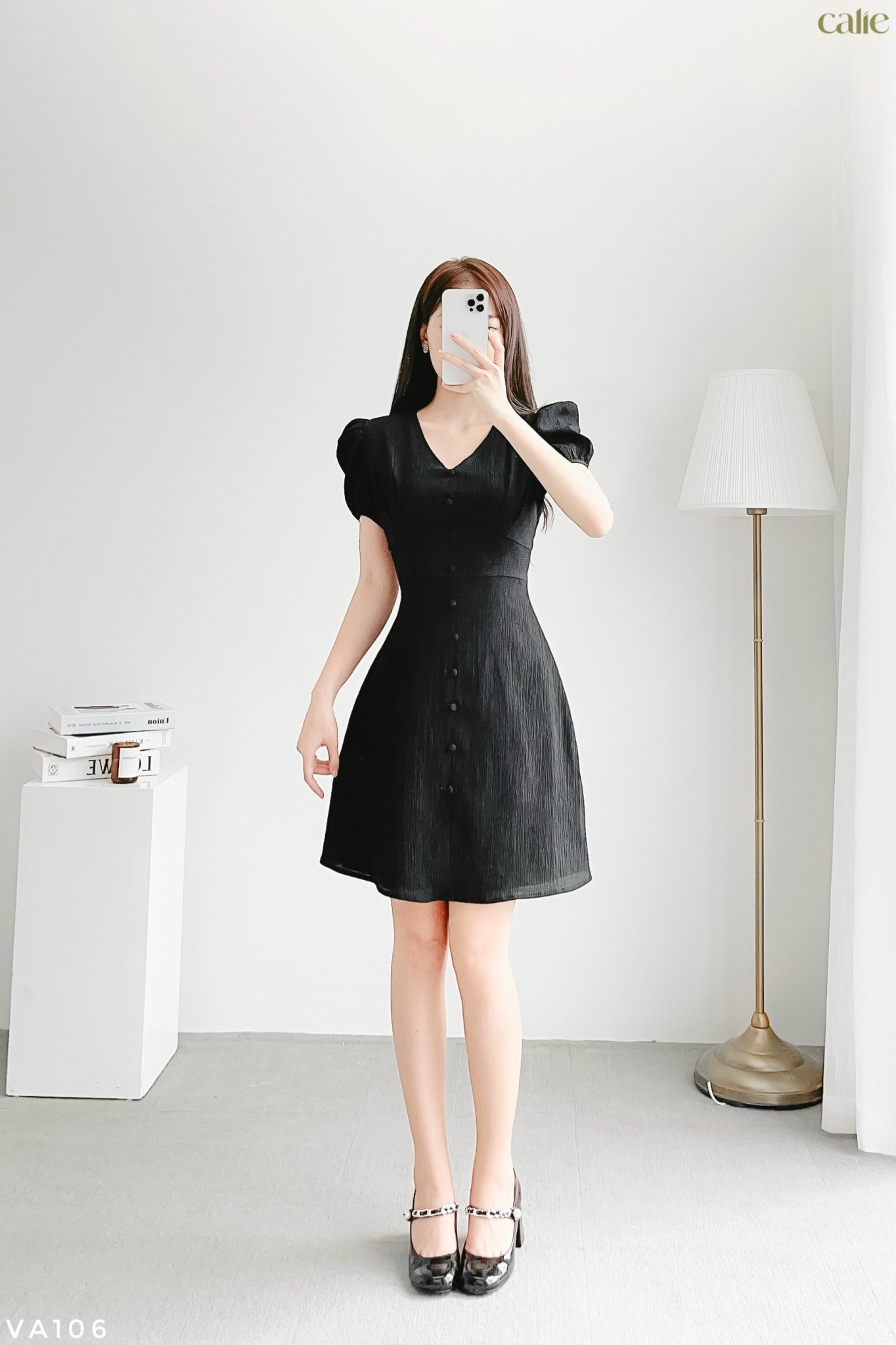 Váy dáng A tay bồng cúc bọc trẻ trung