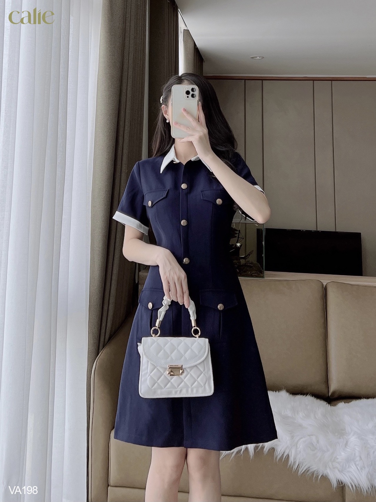 Váy dáng A tay phối cúc đồng trẻ trung