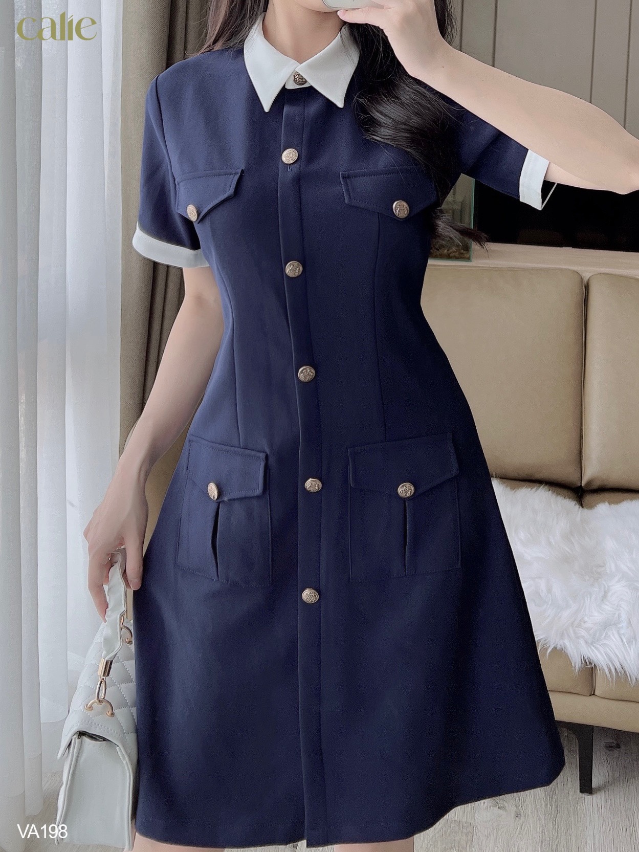 Váy dáng A tay phối cúc đồng trẻ trung