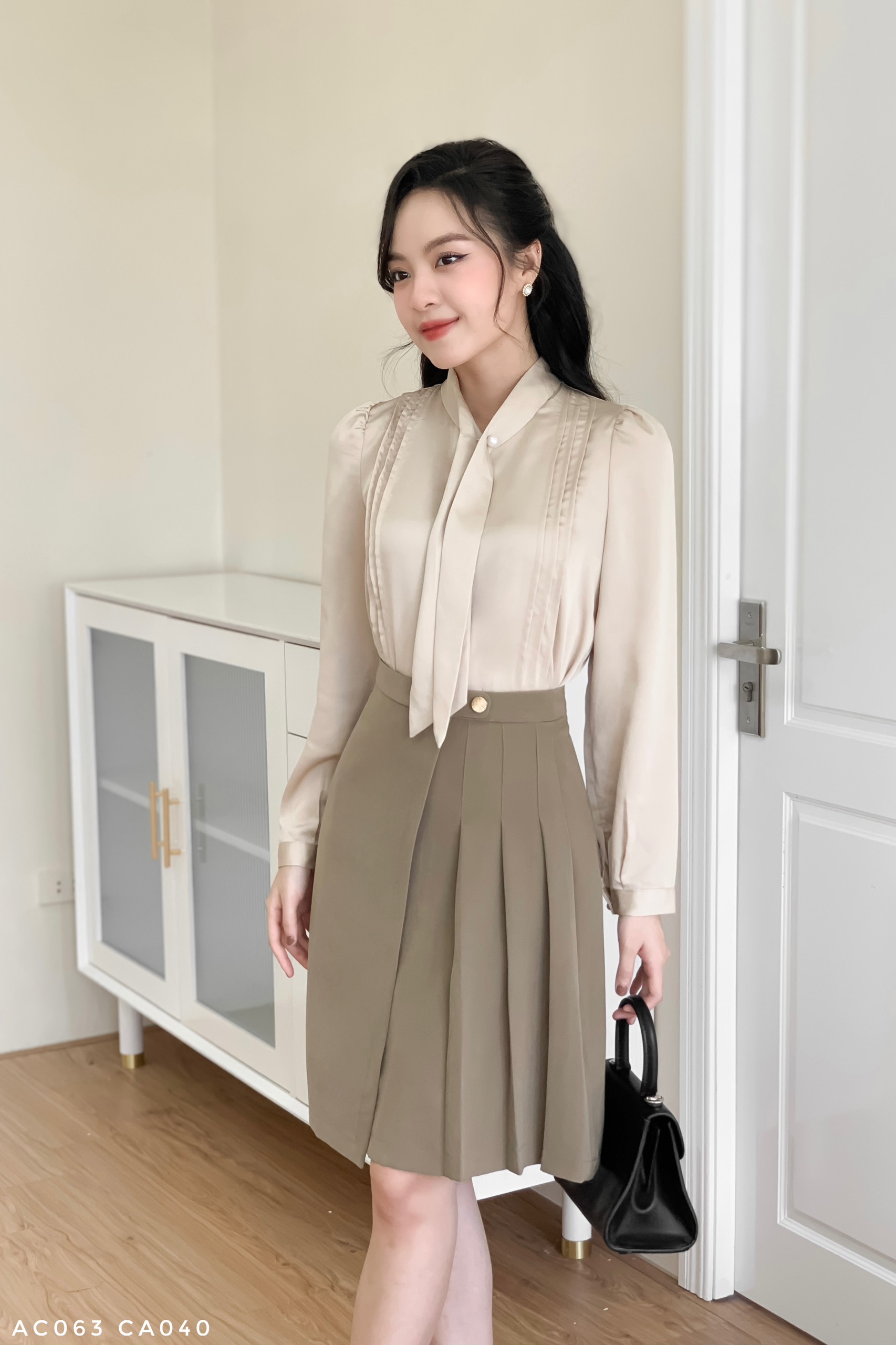Chân váy A dáng dài phối xếp ly nữ tính