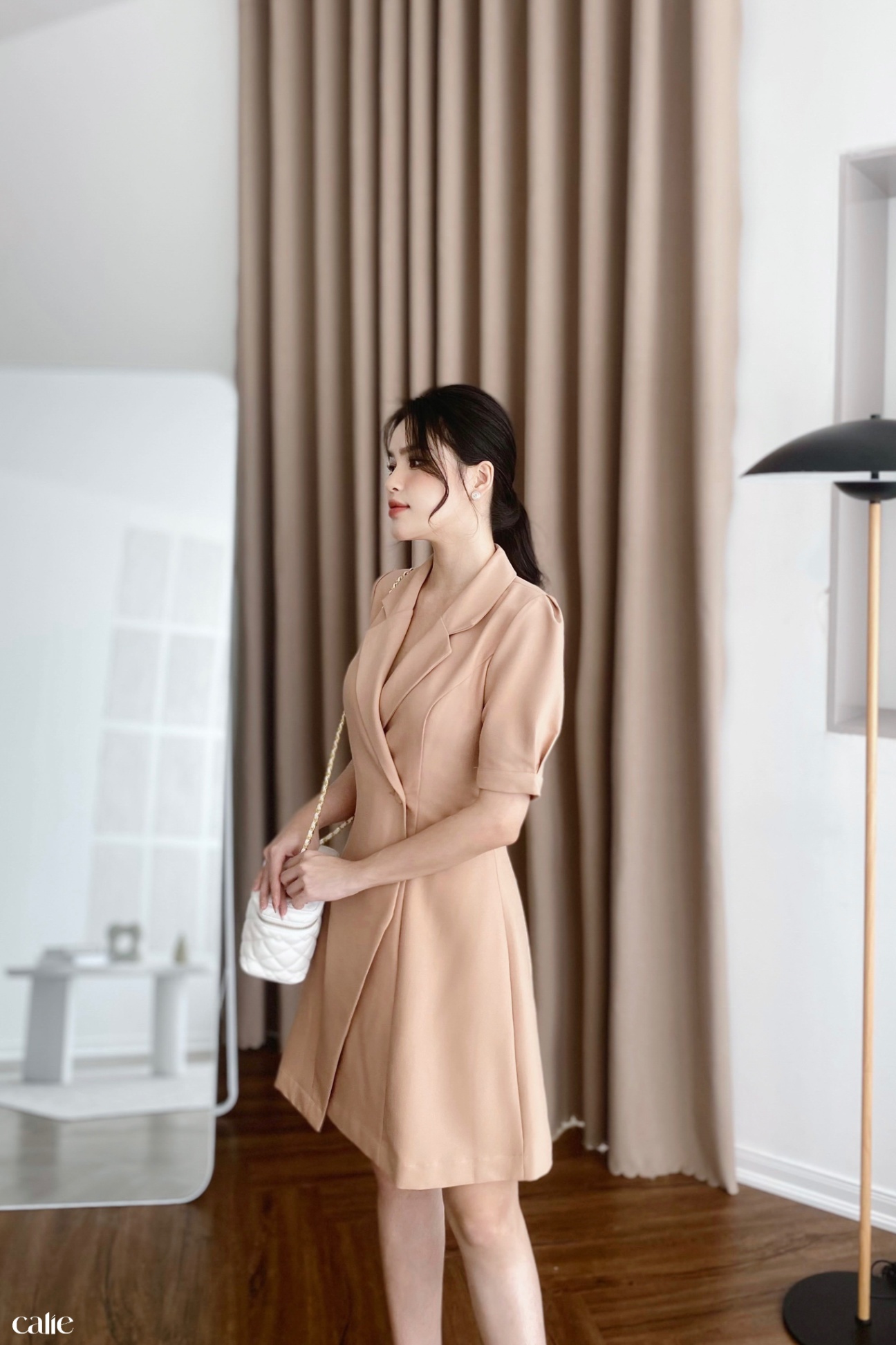 Váy dáng A cổ vest vạt lệch đính cúc