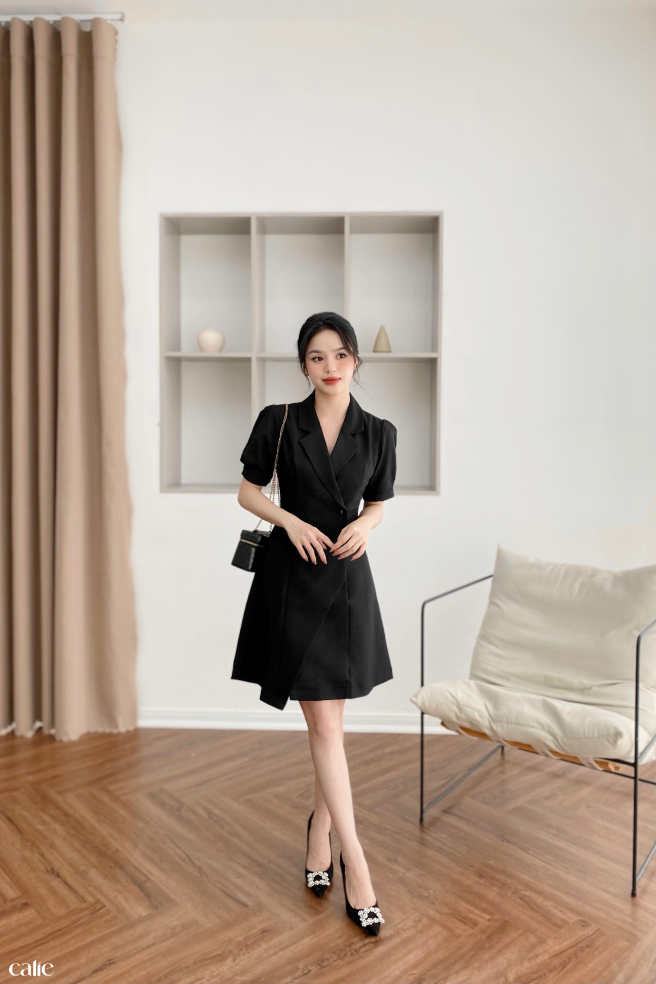 Váy dáng A cổ vest vạt lệch đính cúc