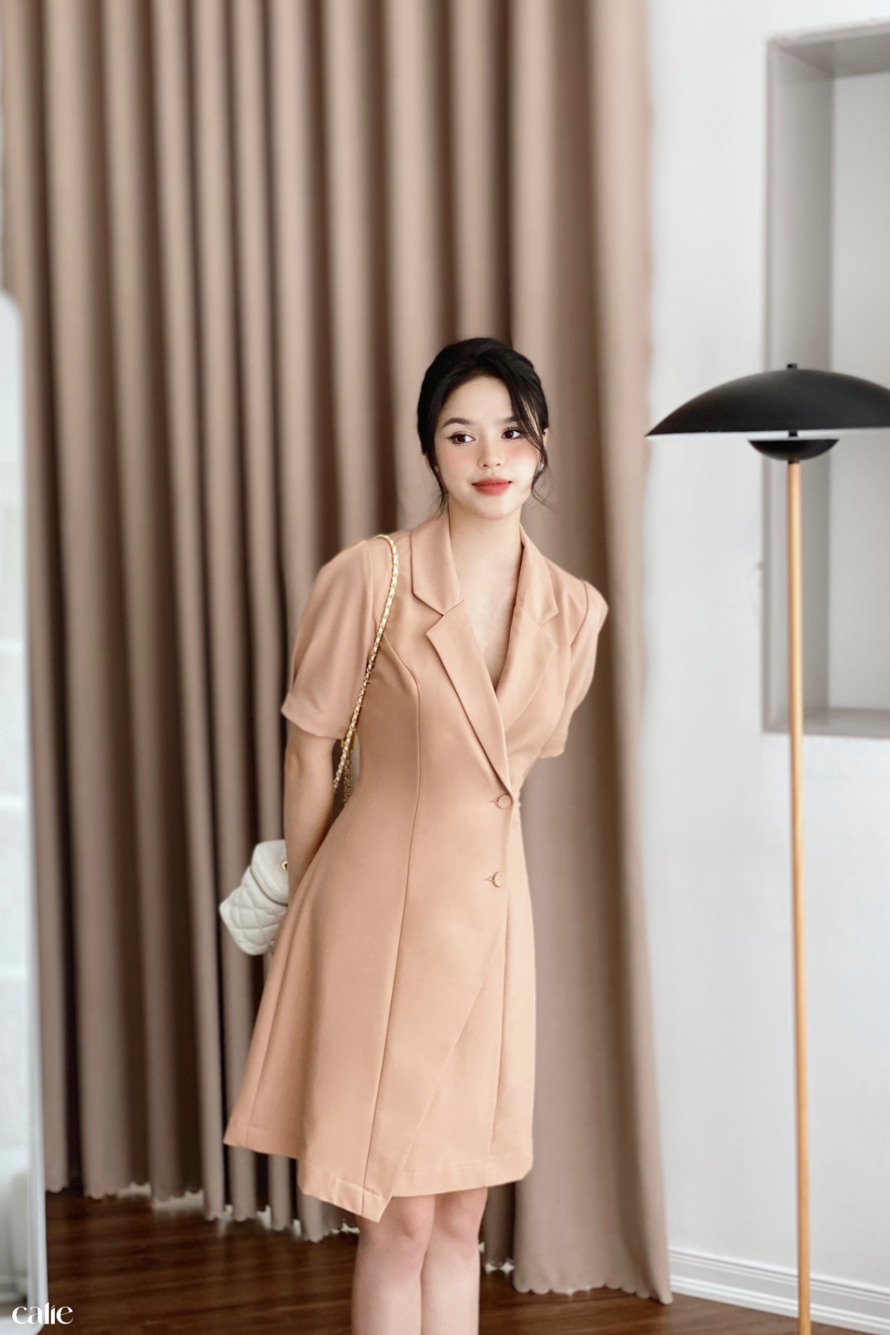 Váy dáng A cổ vest vạt lệch đính cúc