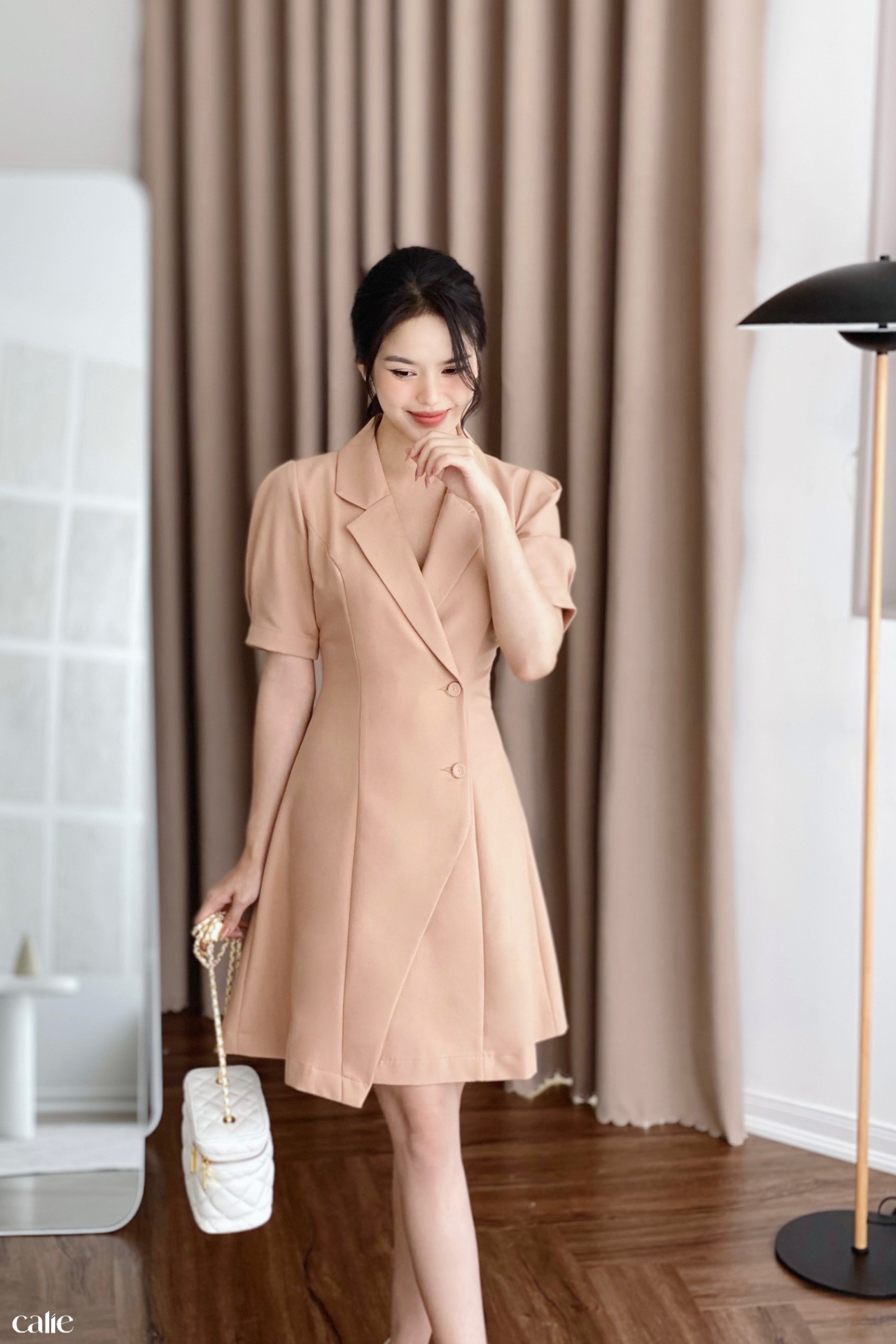 Váy dáng A cổ vest vạt lệch đính cúc