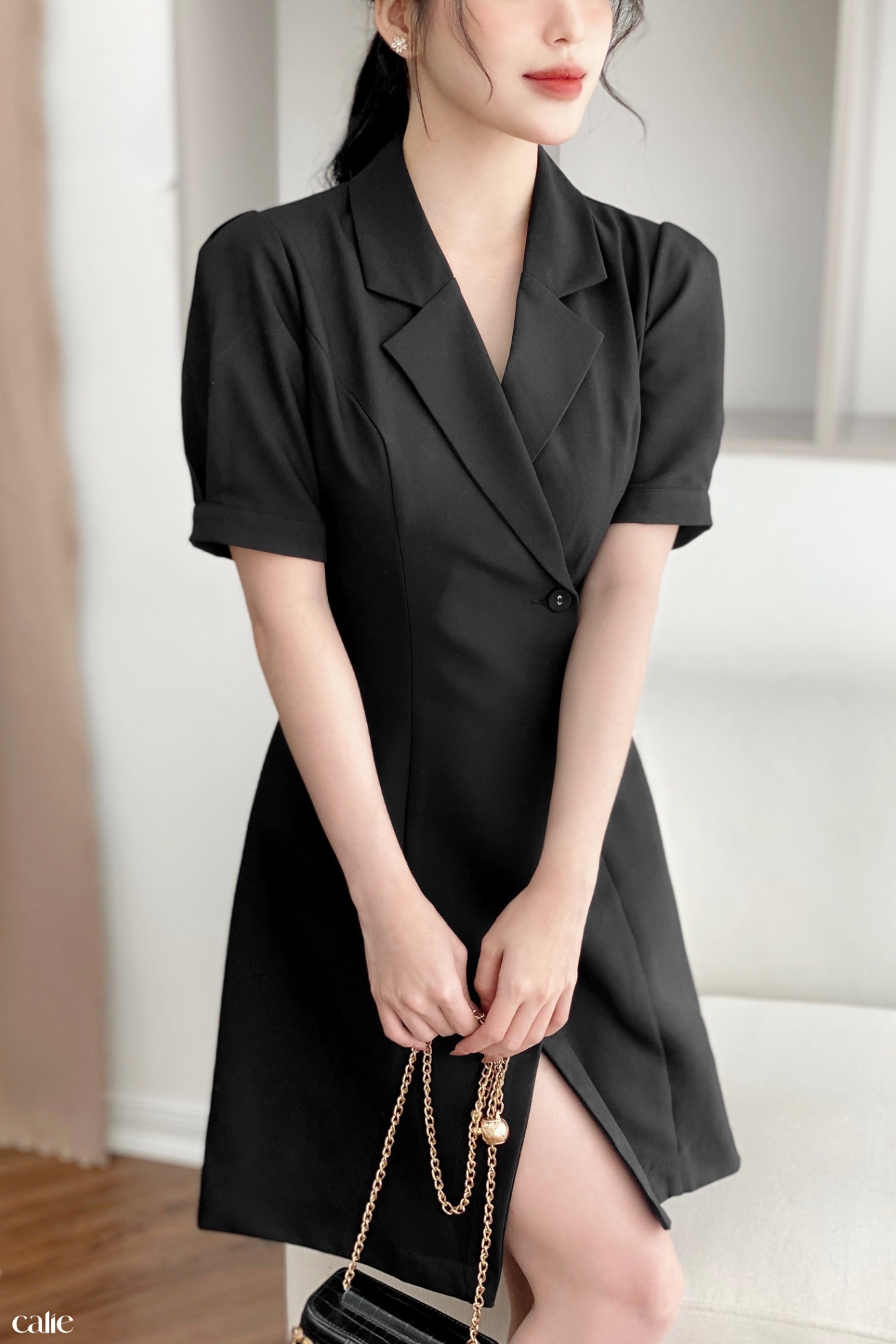Váy dáng A cổ vest vạt lệch đính cúc