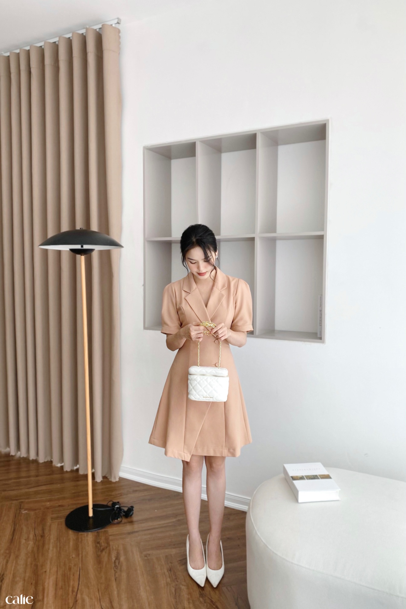 Váy dáng A cổ vest vạt lệch đính cúc