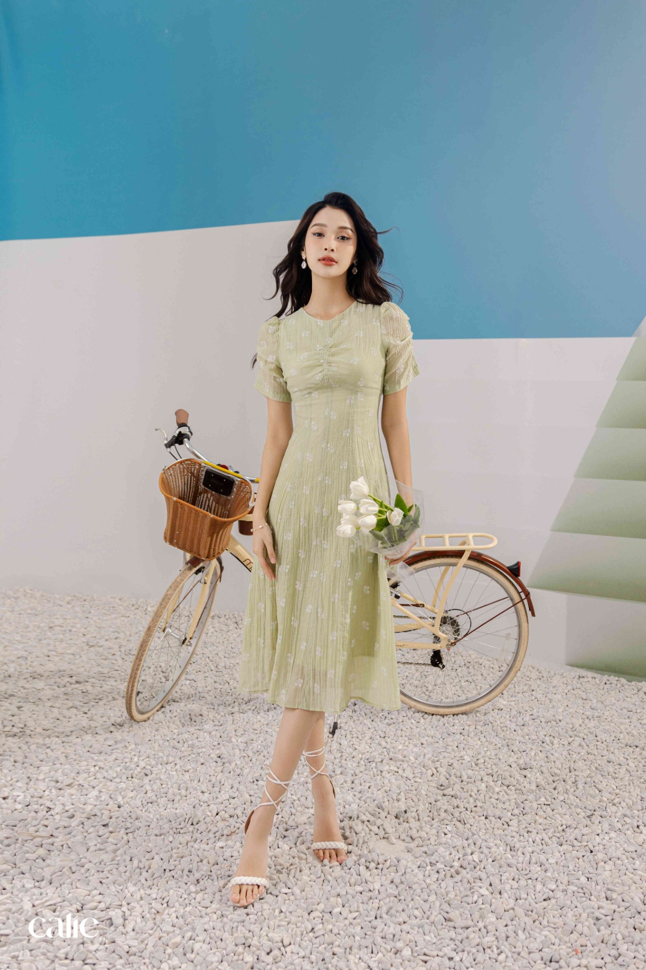Váy dáng midi tay nhún chun cổ V can chân ngực