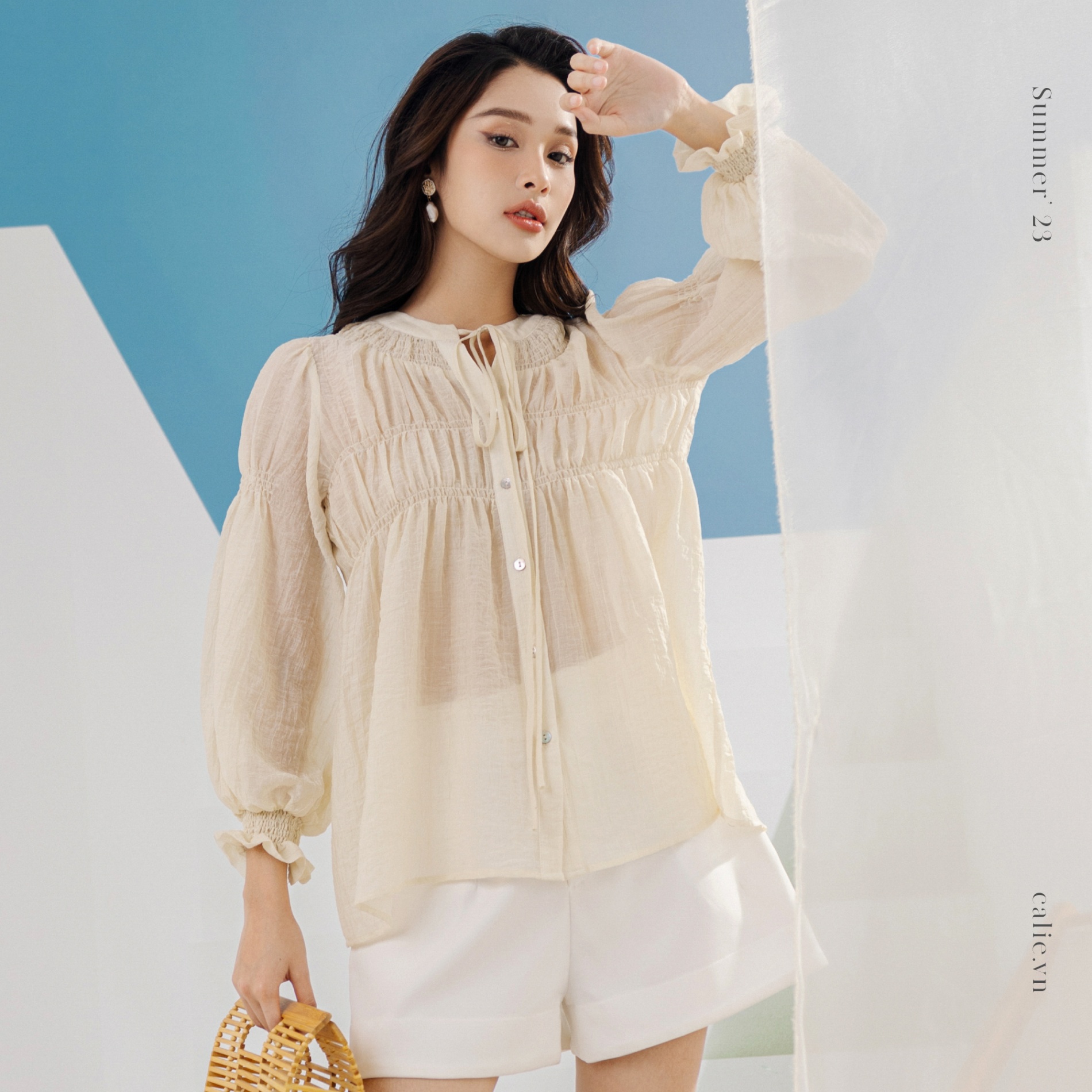 áo sơ mi diễu chỉ chun thân trước