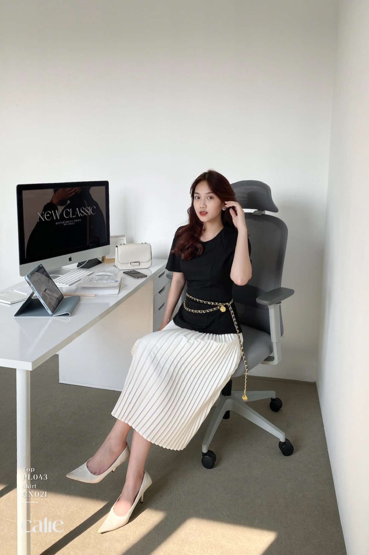 Áo peplum cổ tròn xẻ đáp vai