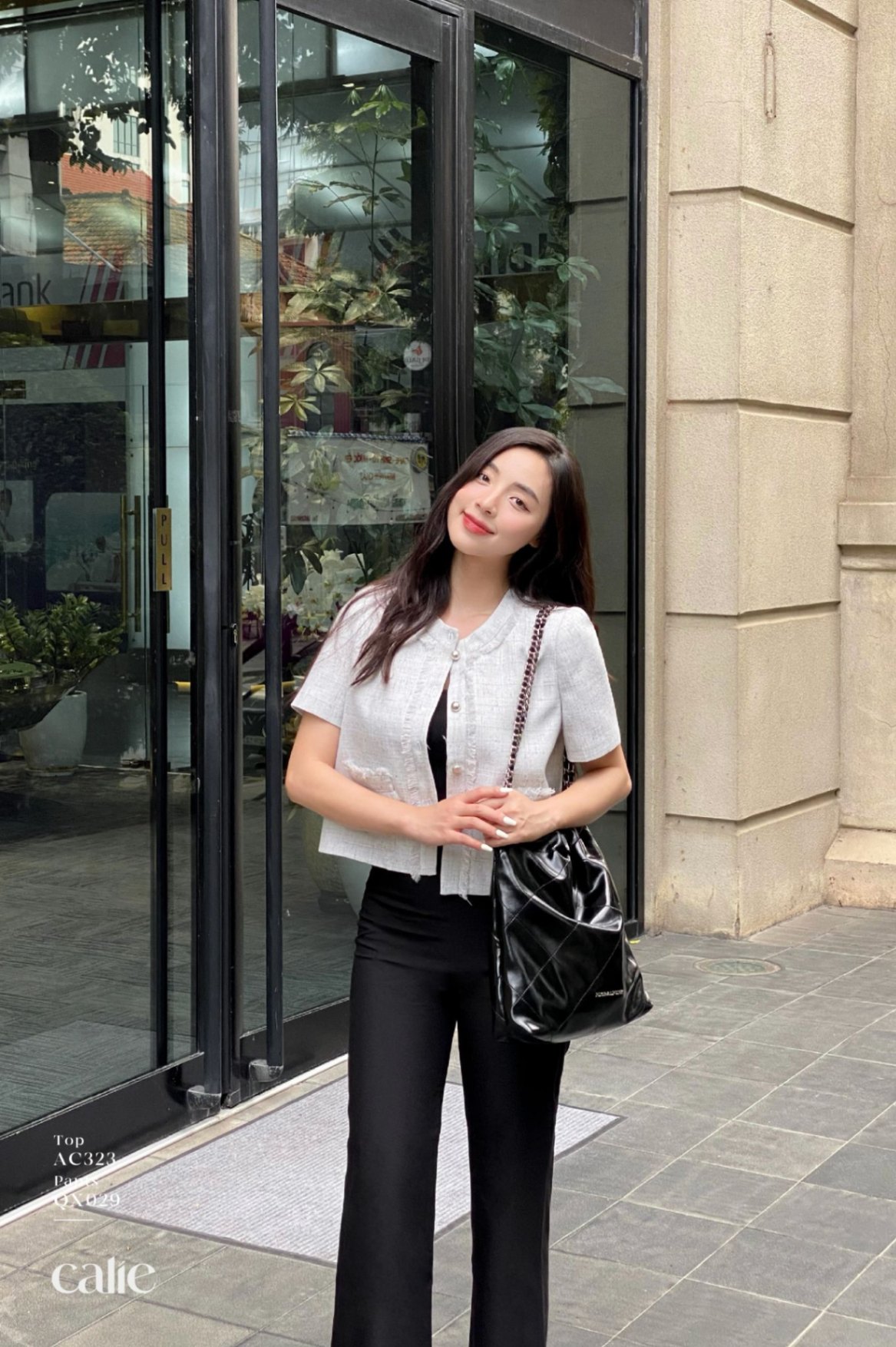 Áo cách điệu cổ tròn phối tua rua