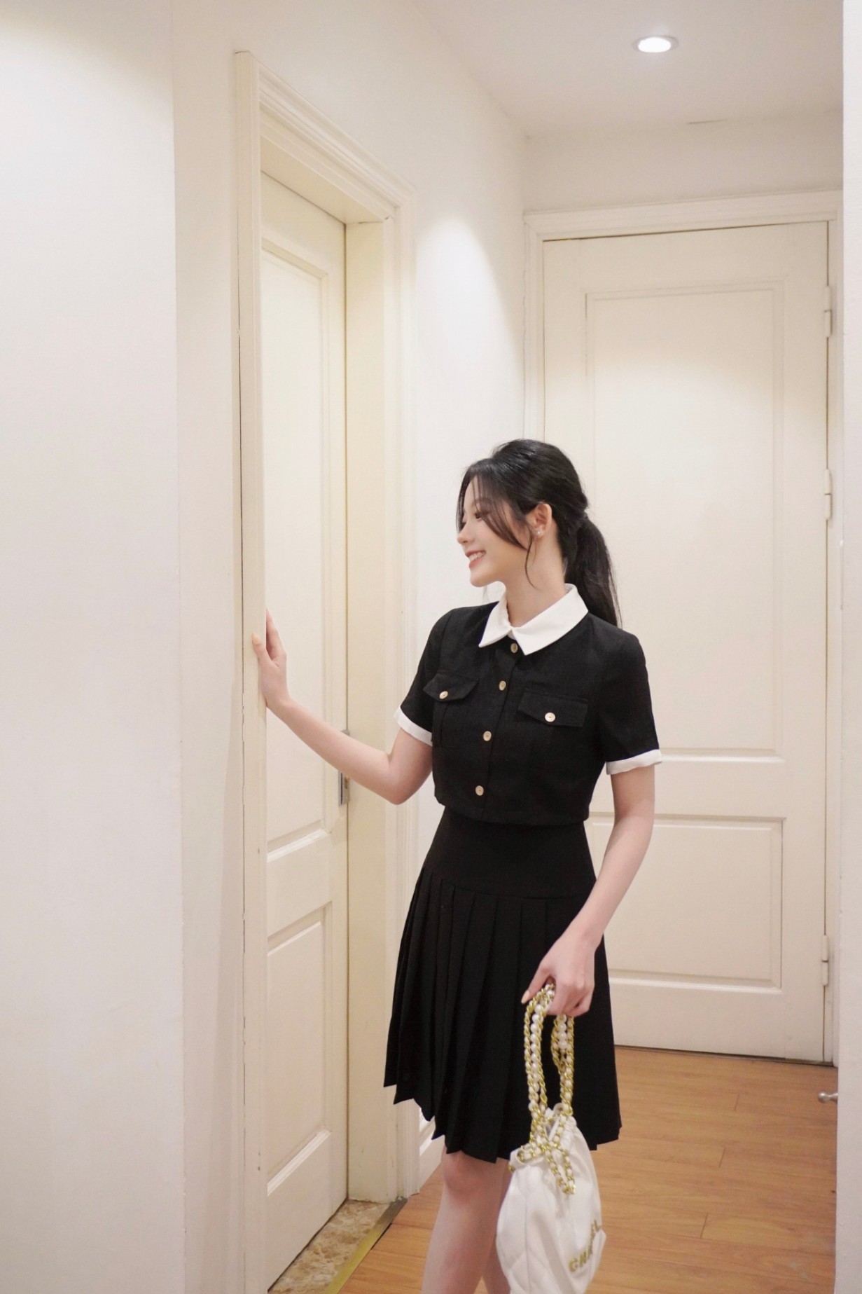 Váy dáng xòe giả sét xếp ly chân