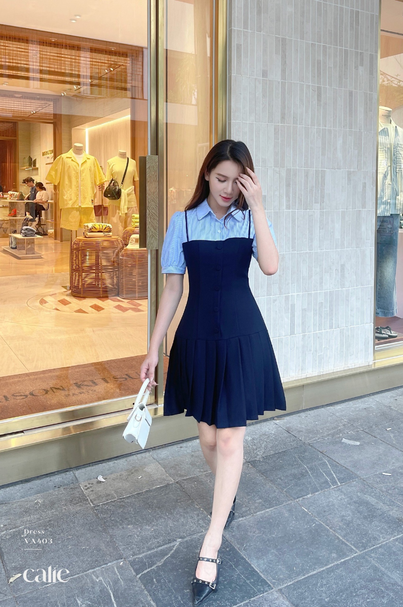 Váy dáng A phối cổ xếp ly chân váy